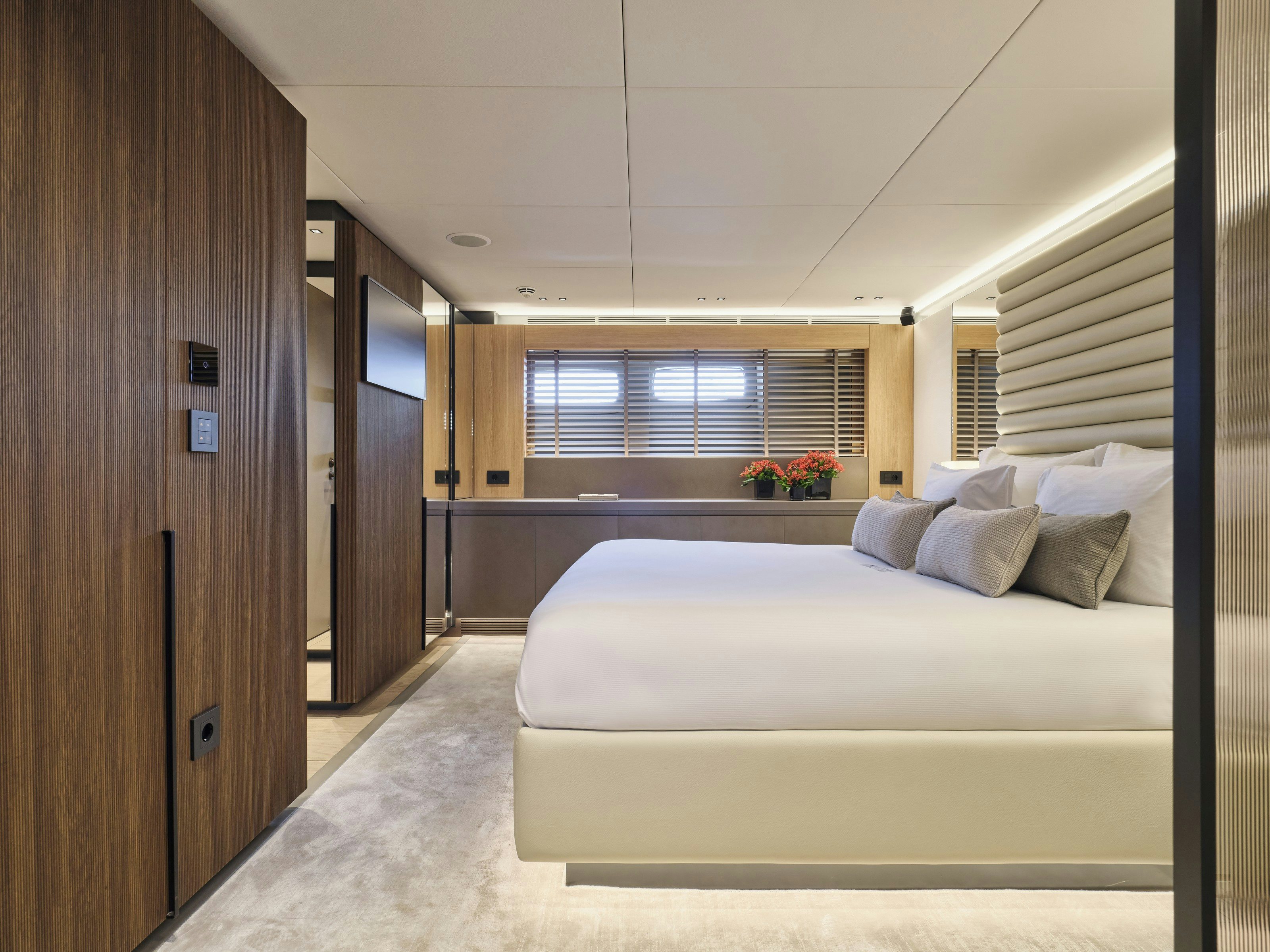 a large bedroom with a large bed aboard MAESTRO Yacht for Charter