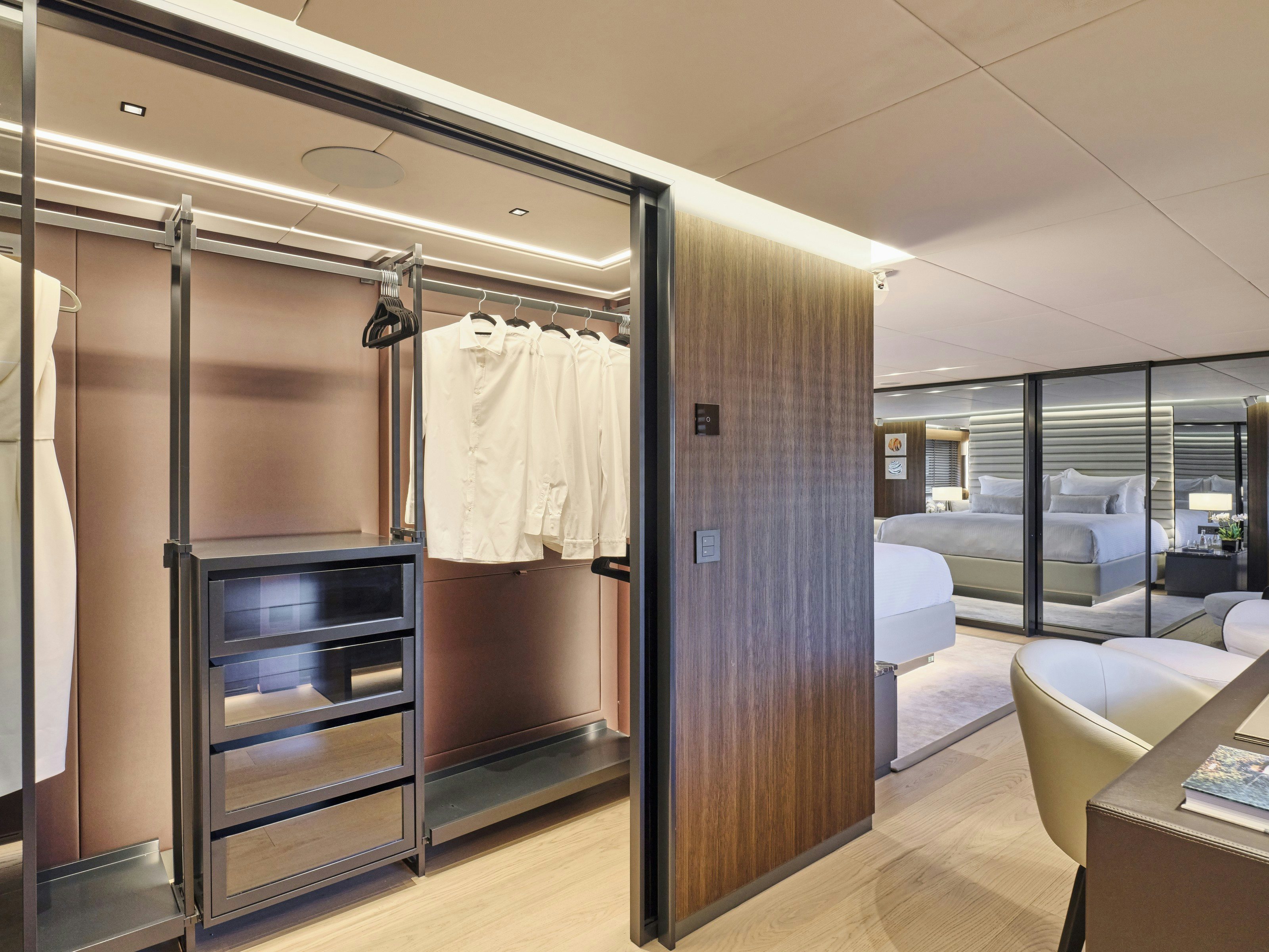 a large closet in a room aboard MAESTRO Yacht for Charter