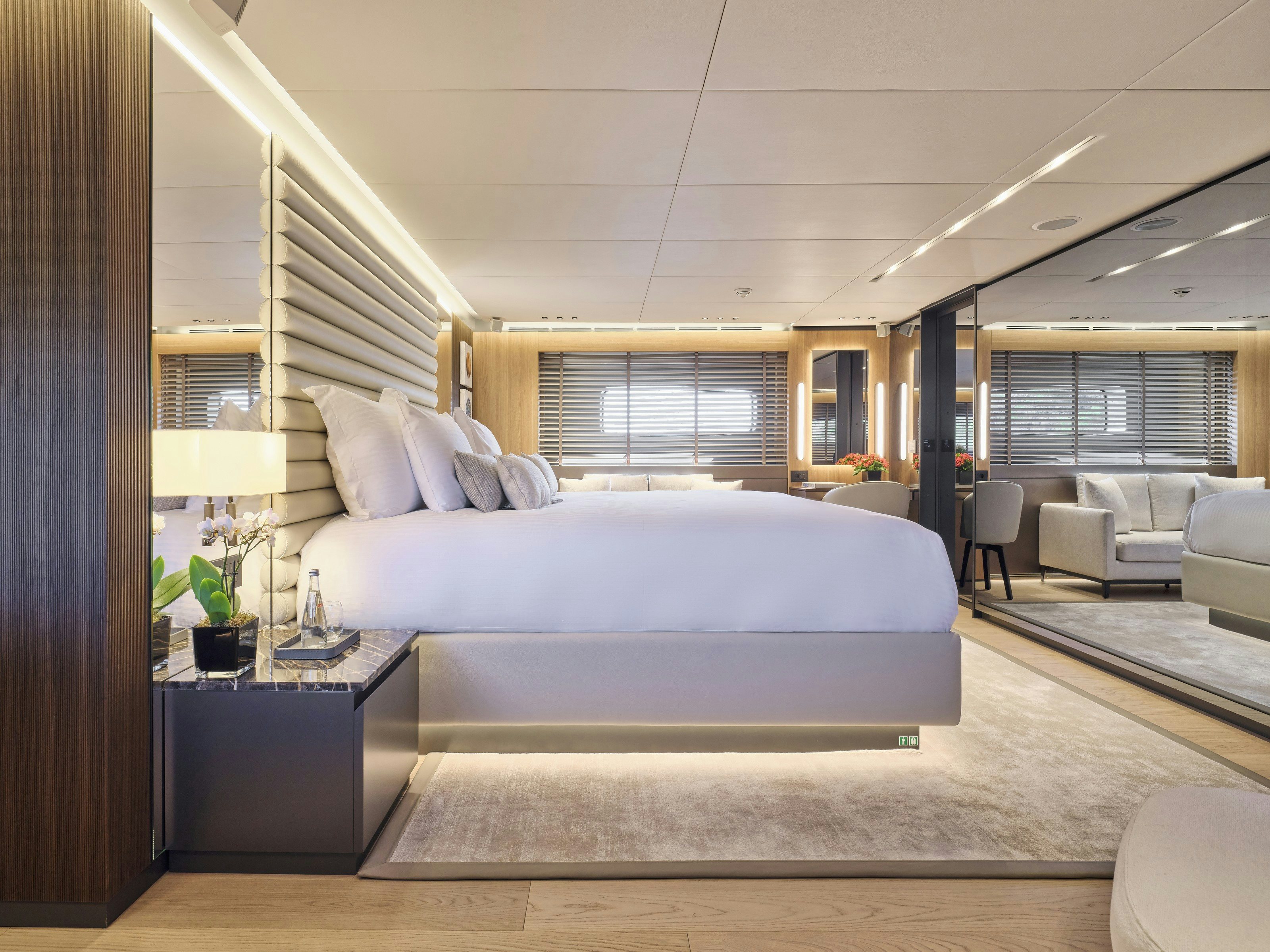 a large bedroom with a large bed aboard MAESTRO Yacht for Charter