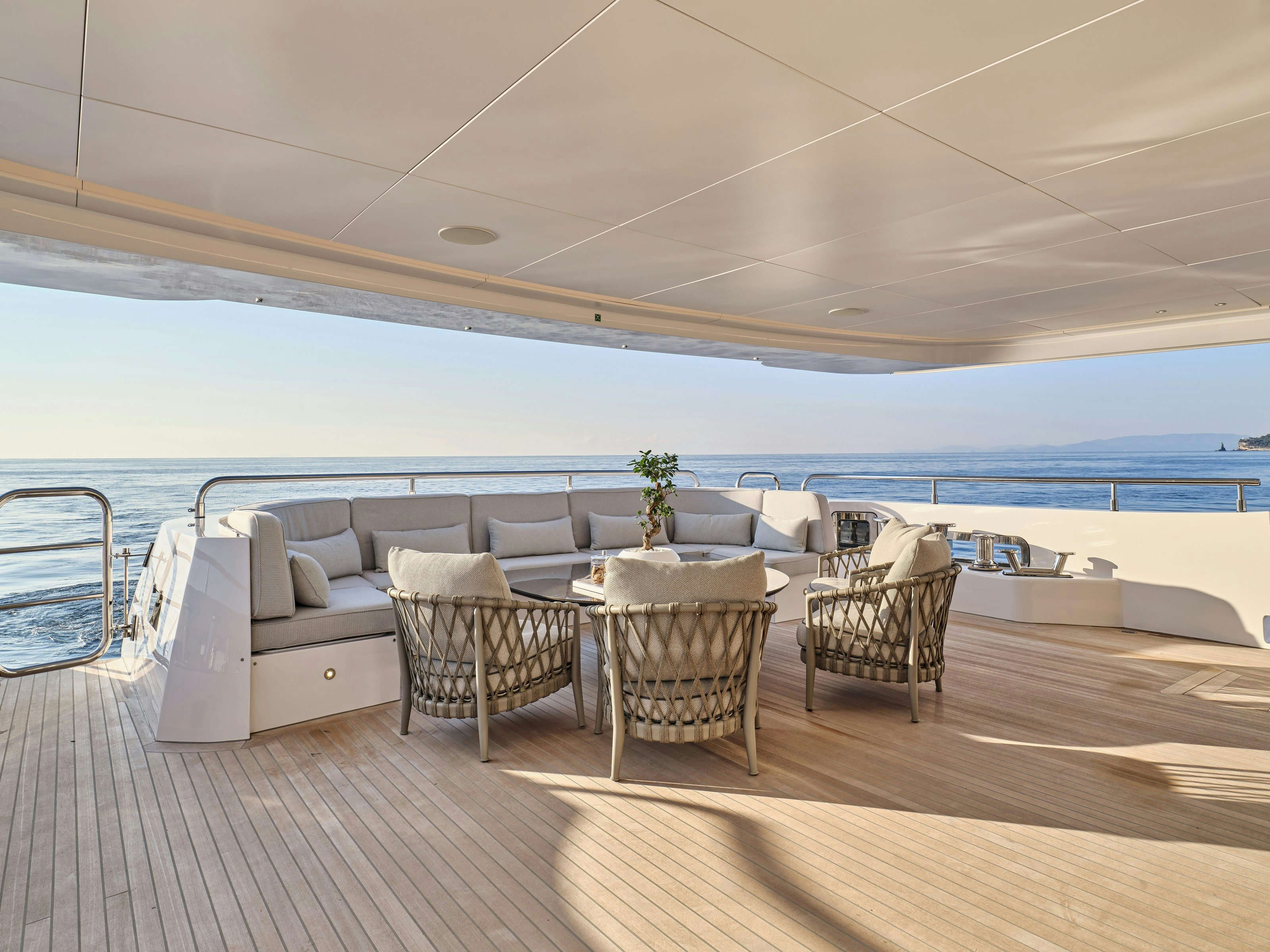 a room with a table and chairs aboard MAESTRO Yacht for Charter