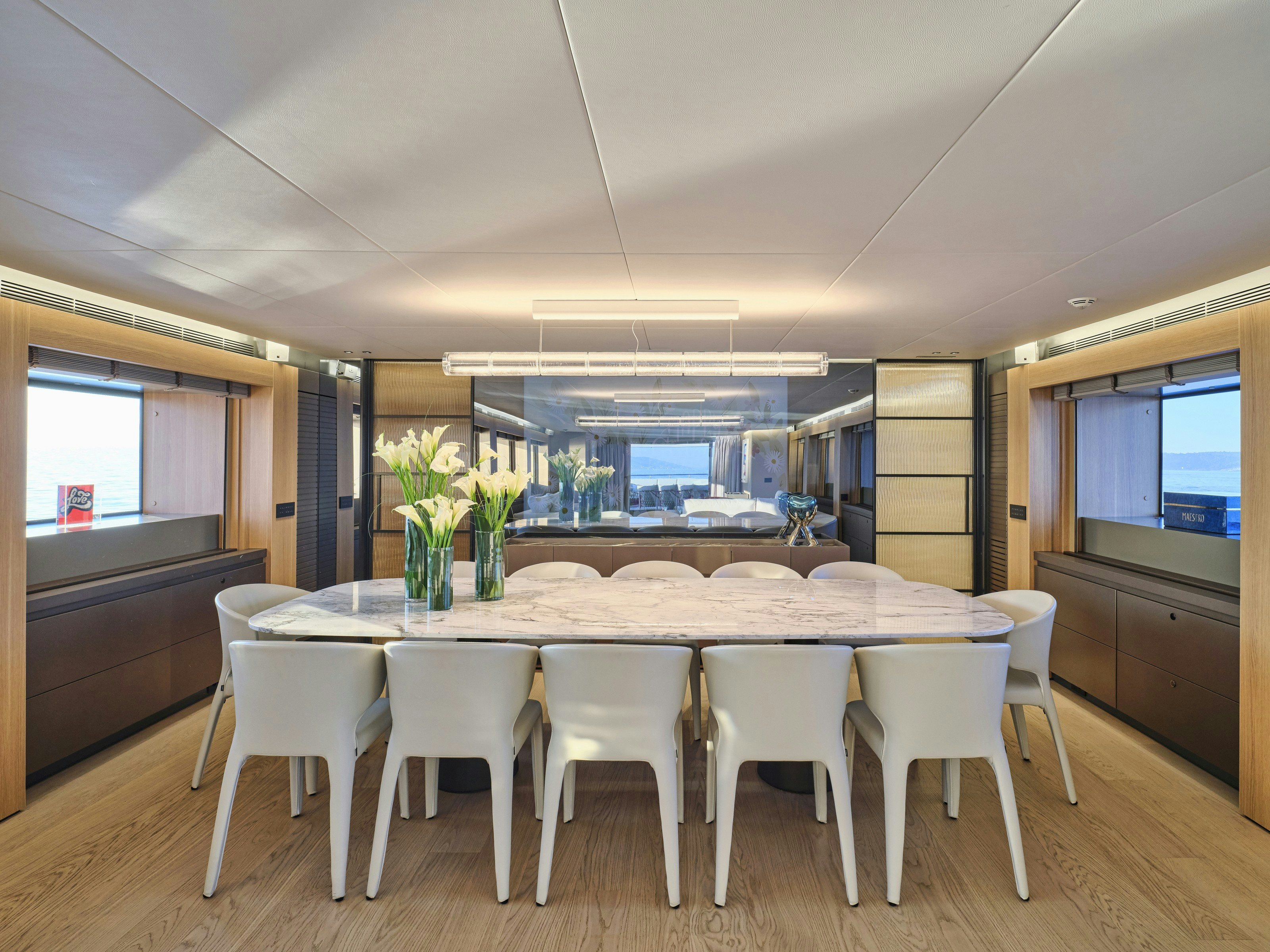 a dining table in a kitchen aboard MAESTRO Yacht for Charter