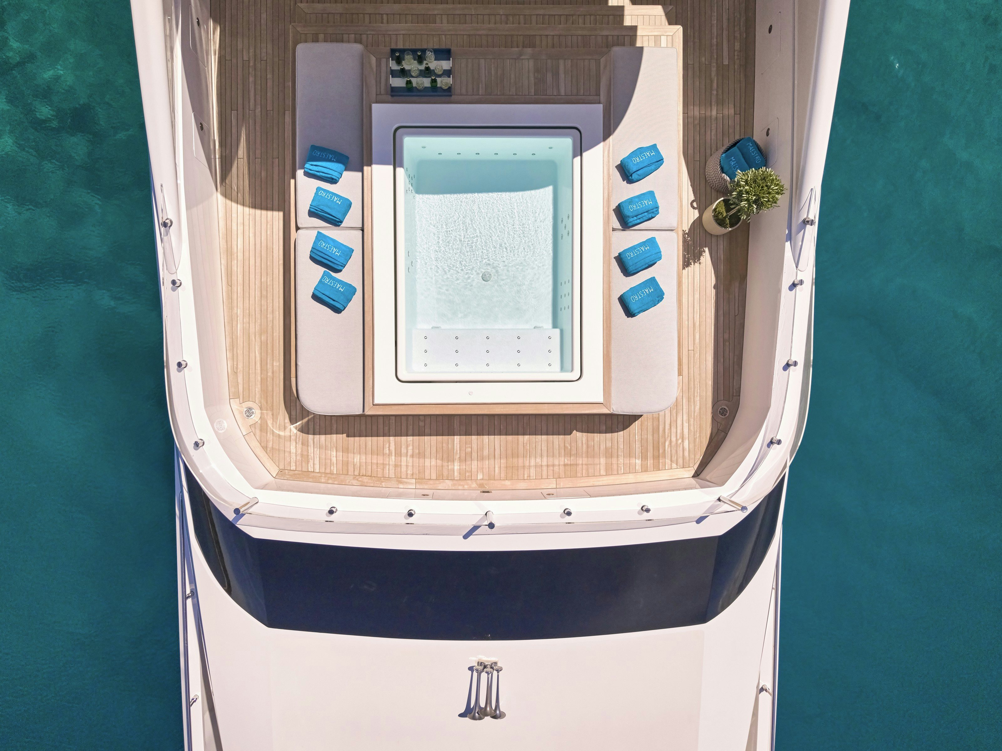 a white microwave with a blue light aboard MAESTRO Yacht for Charter