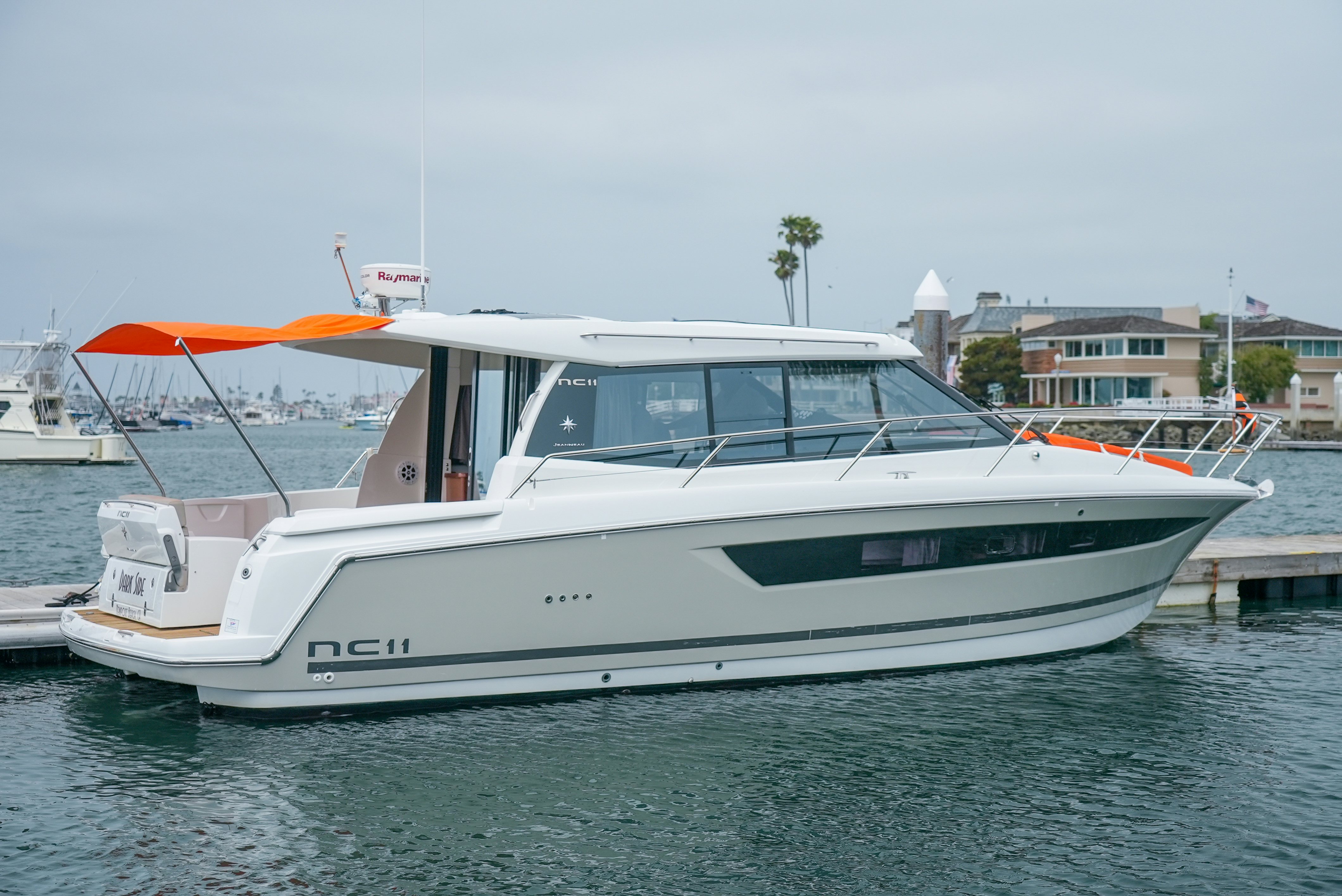 a white yacht in the water aboard DARK SIDE Yacht for Sale