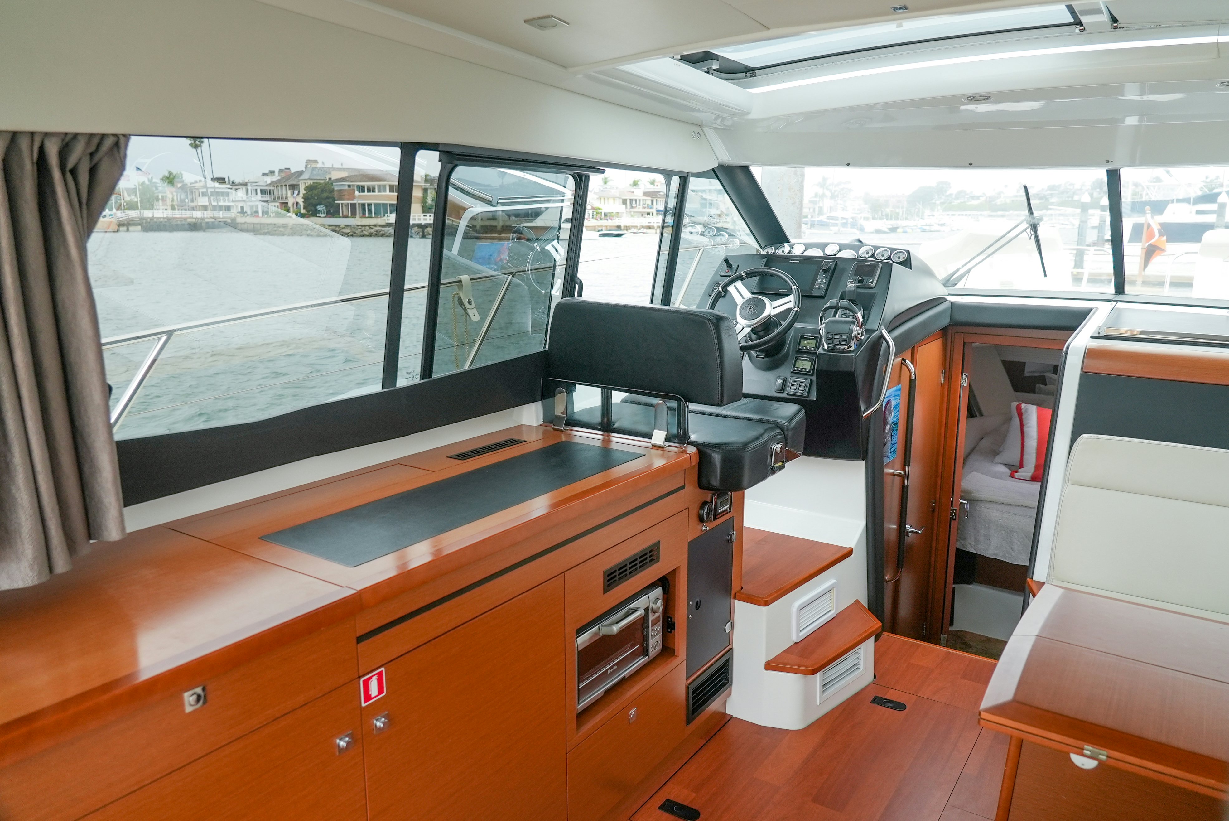 a room with a desk and a chair aboard DARK SIDE Yacht for Sale