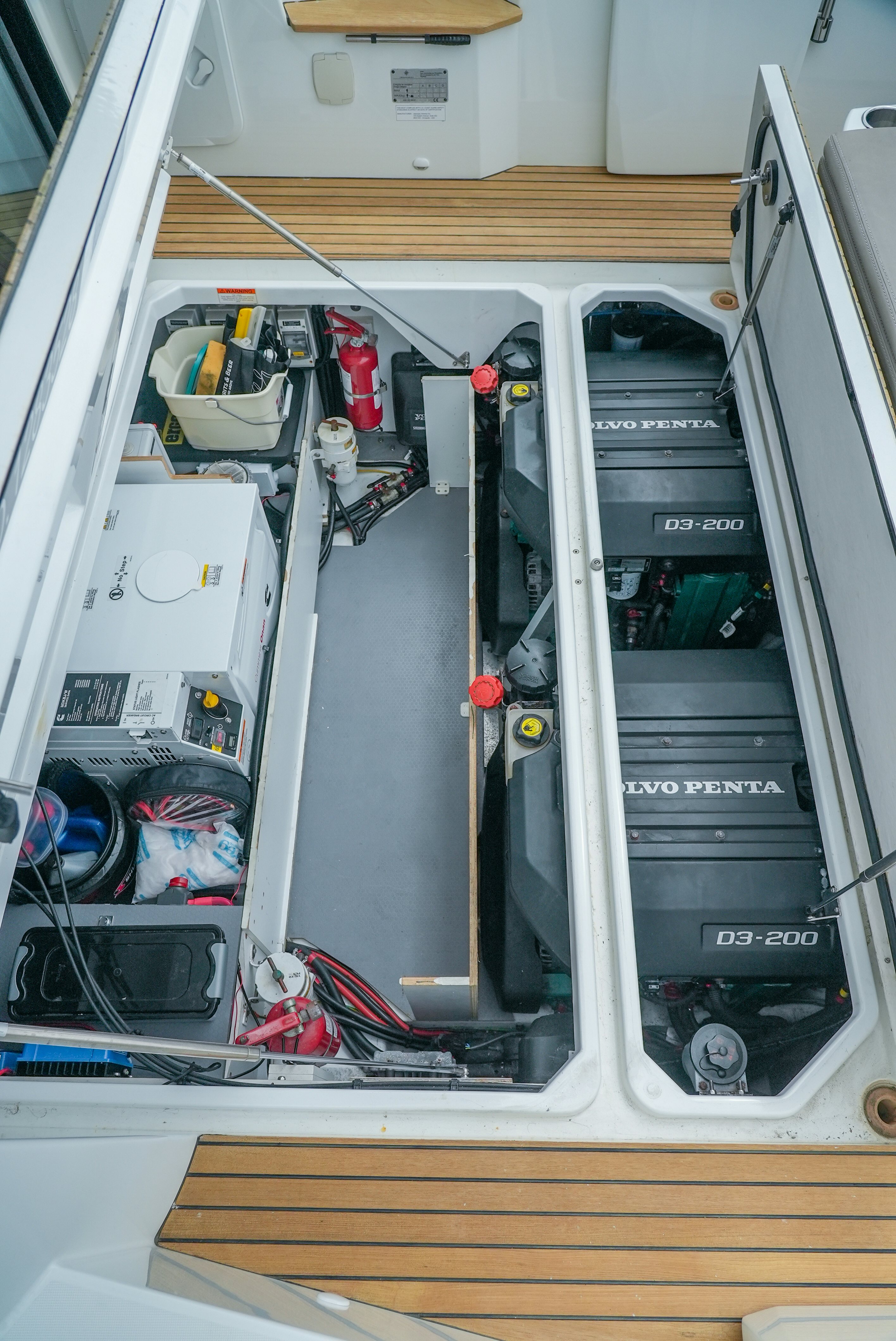a white vehicle with wires aboard DARK SIDE Yacht for Sale