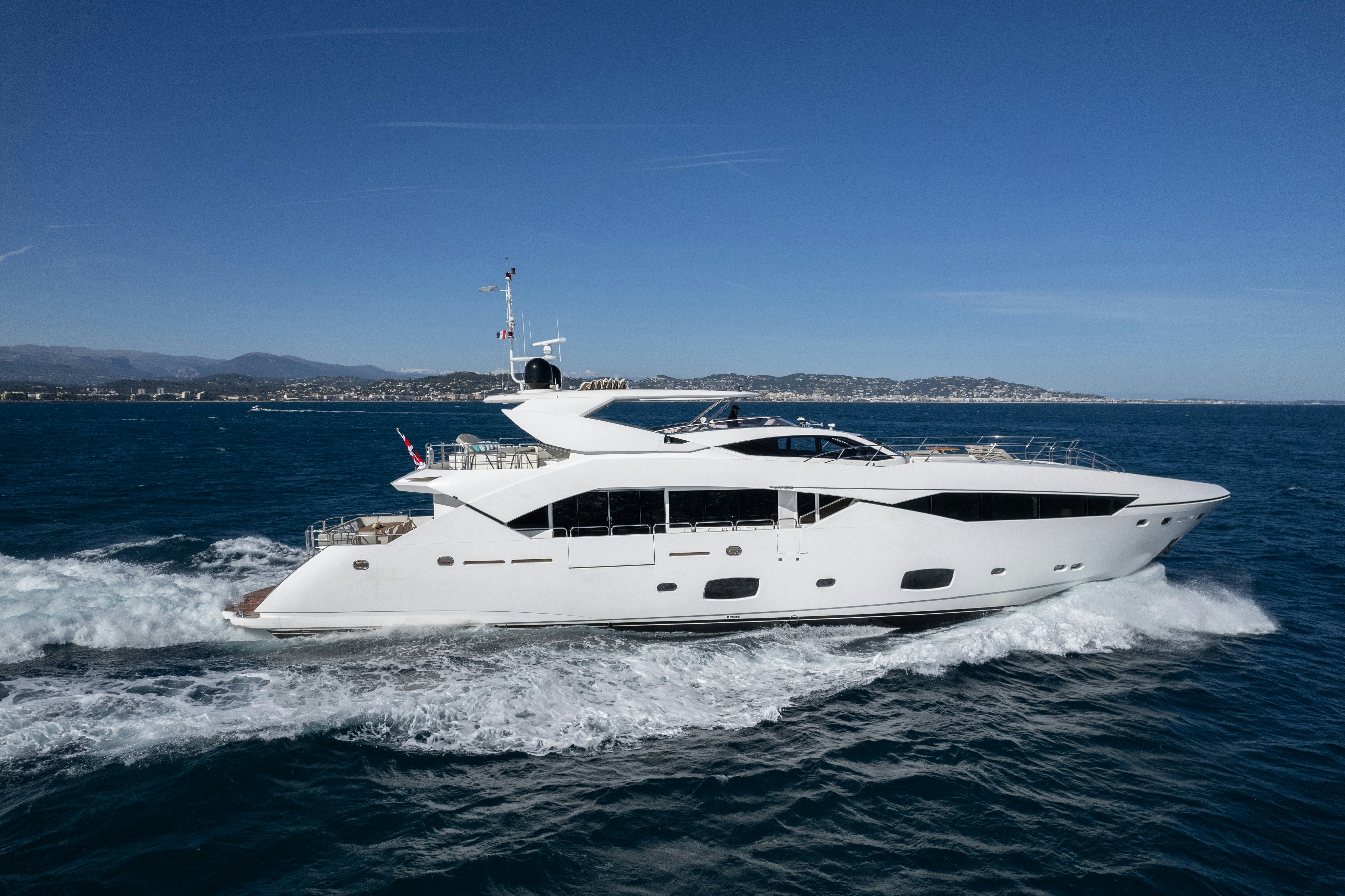 a white yacht on the water aboard LADY VOLANTIS Yacht for Sale
