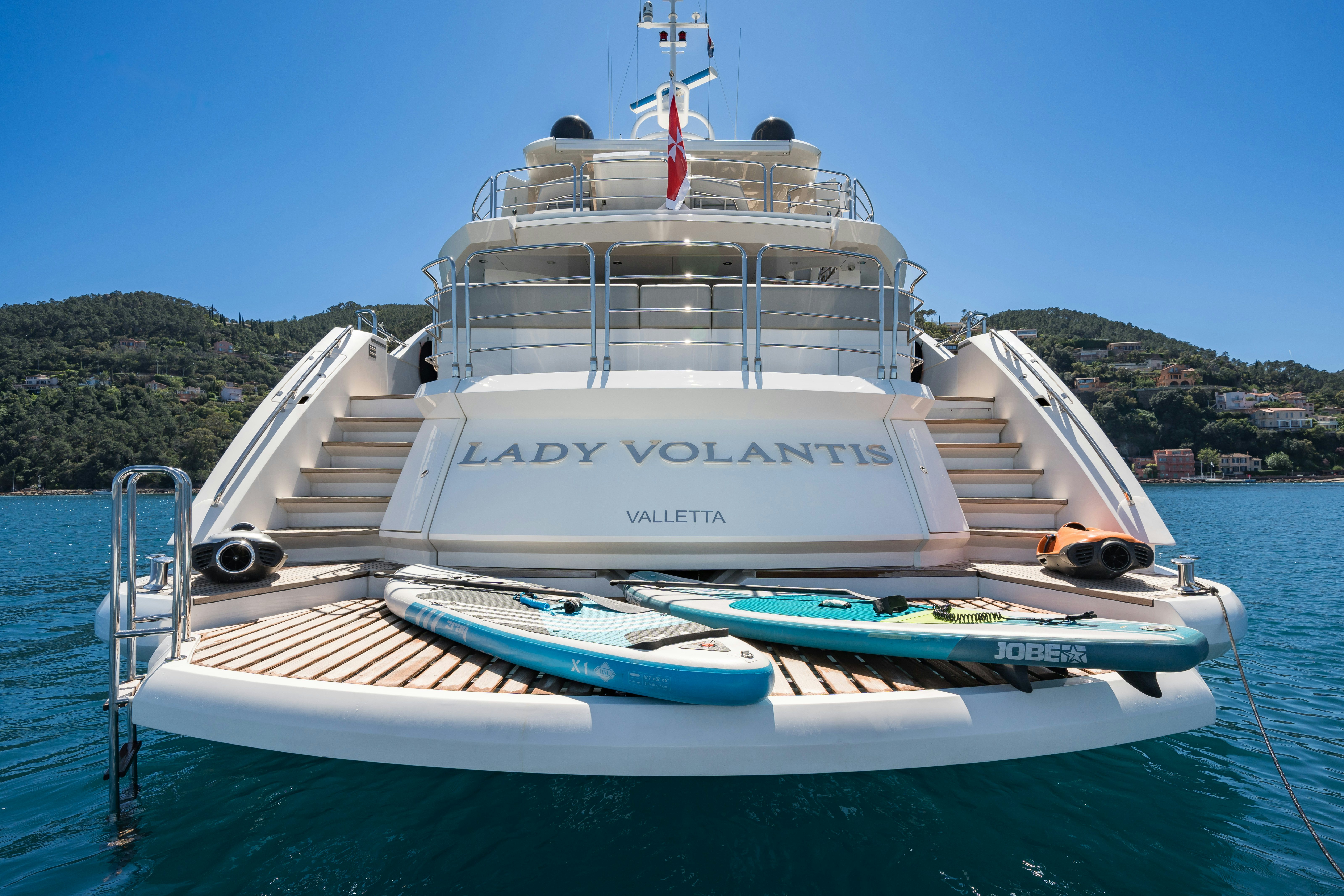 a white boat on the water aboard LADY VOLANTIS Yacht for Sale
