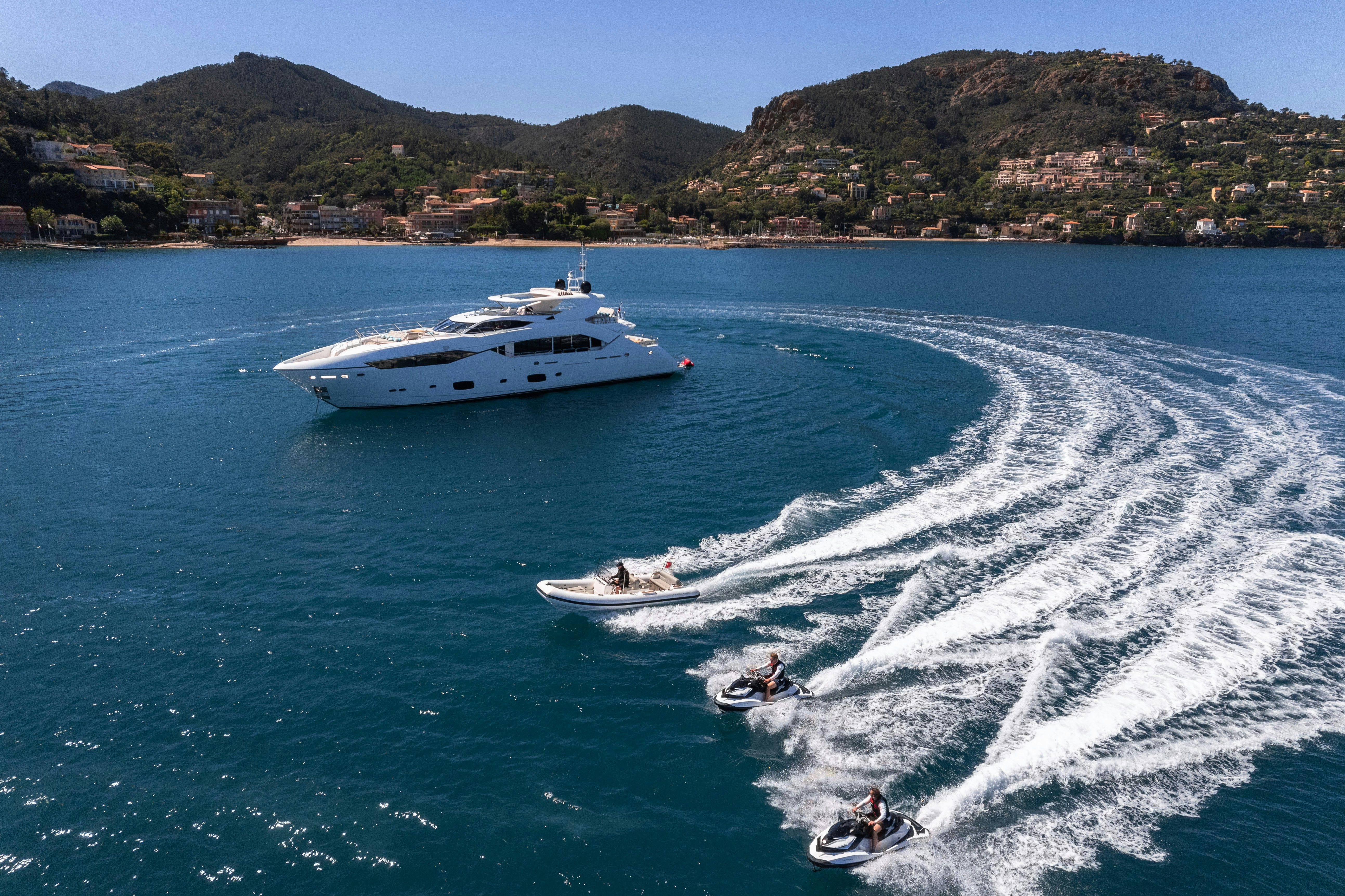 a couple of people water skiing aboard LADY VOLANTIS Yacht for Sale