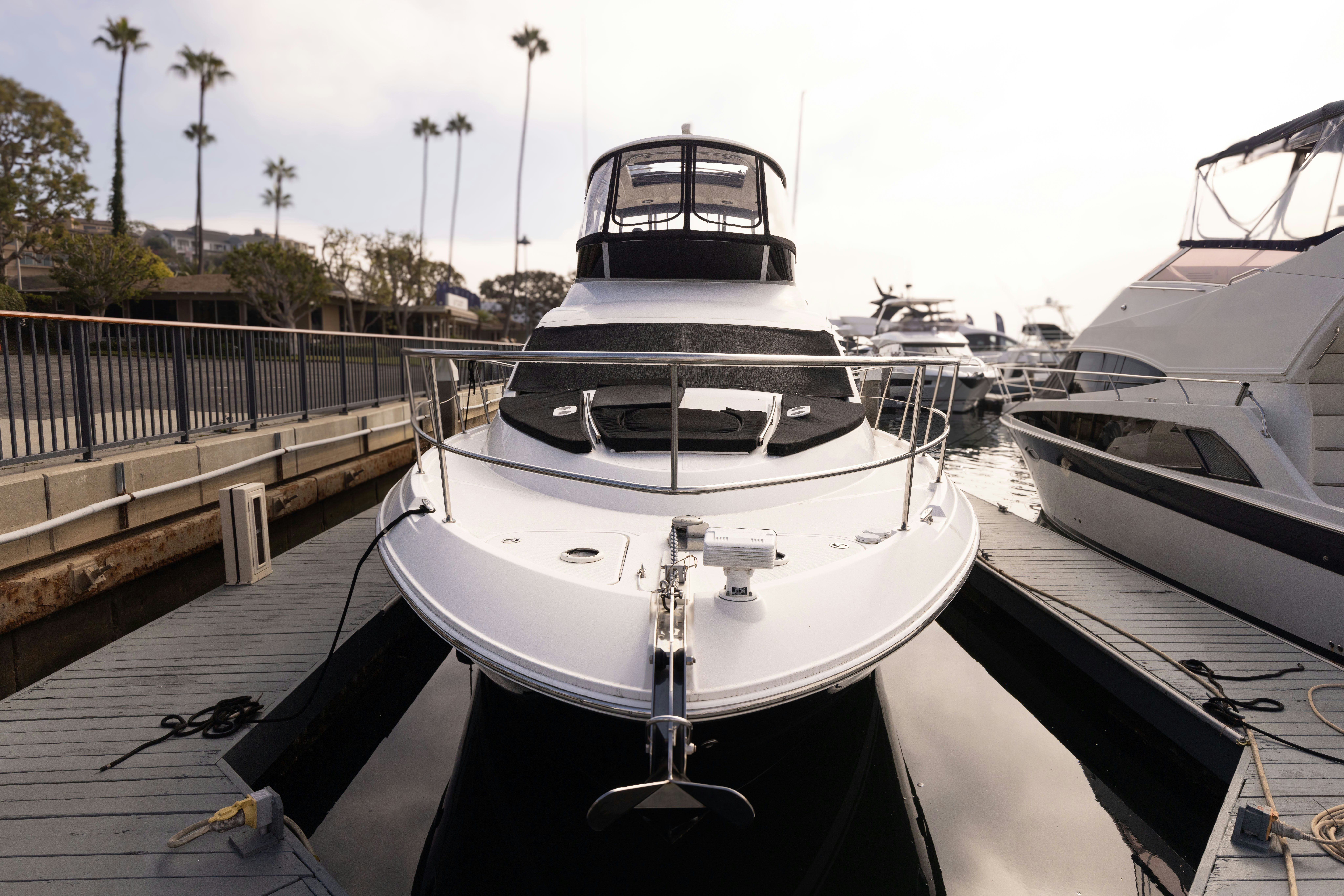 a couple of boats sit in a dock aboard KA-BAR Yacht for Sale