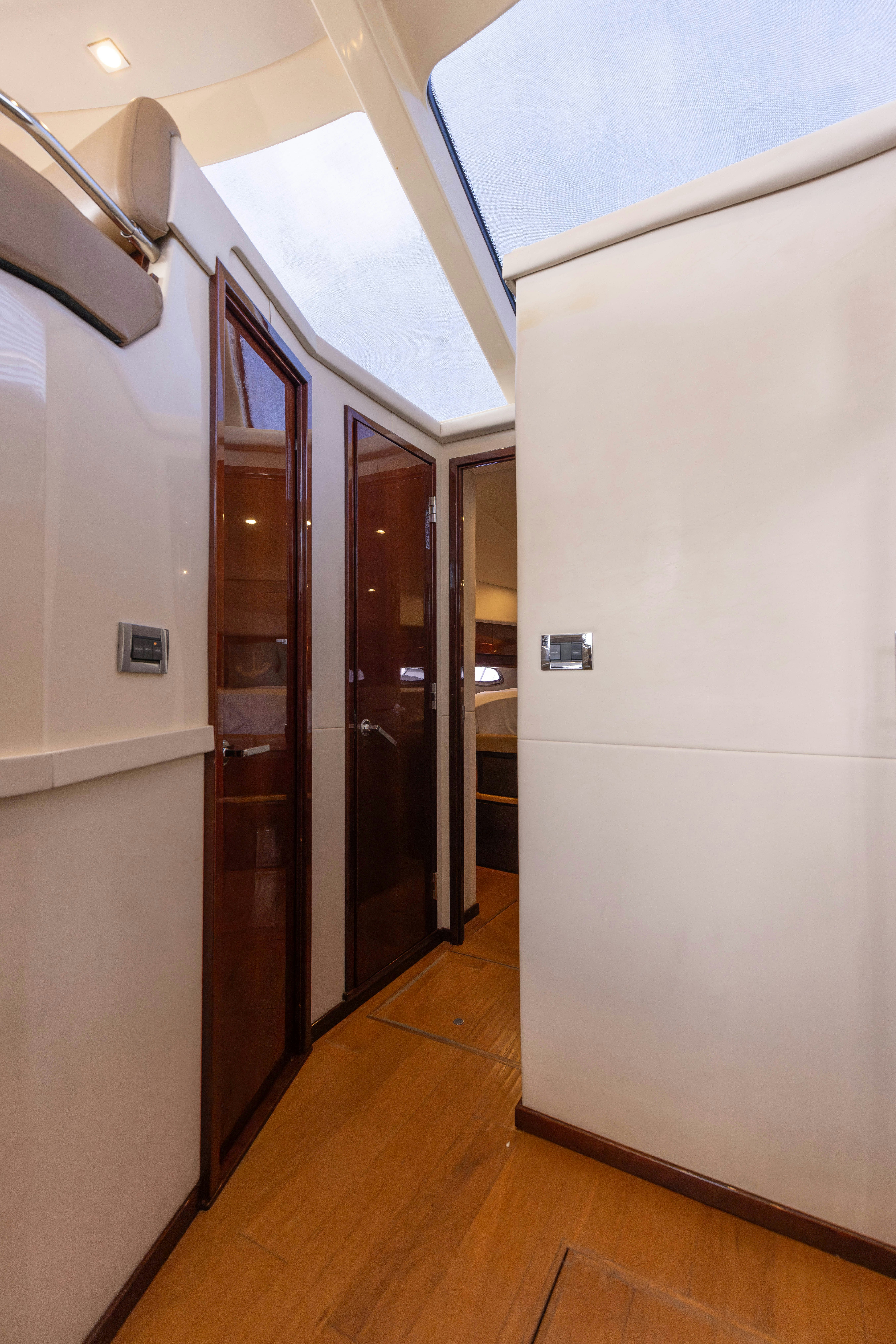a hallway with doors aboard KA-BAR Yacht for Sale