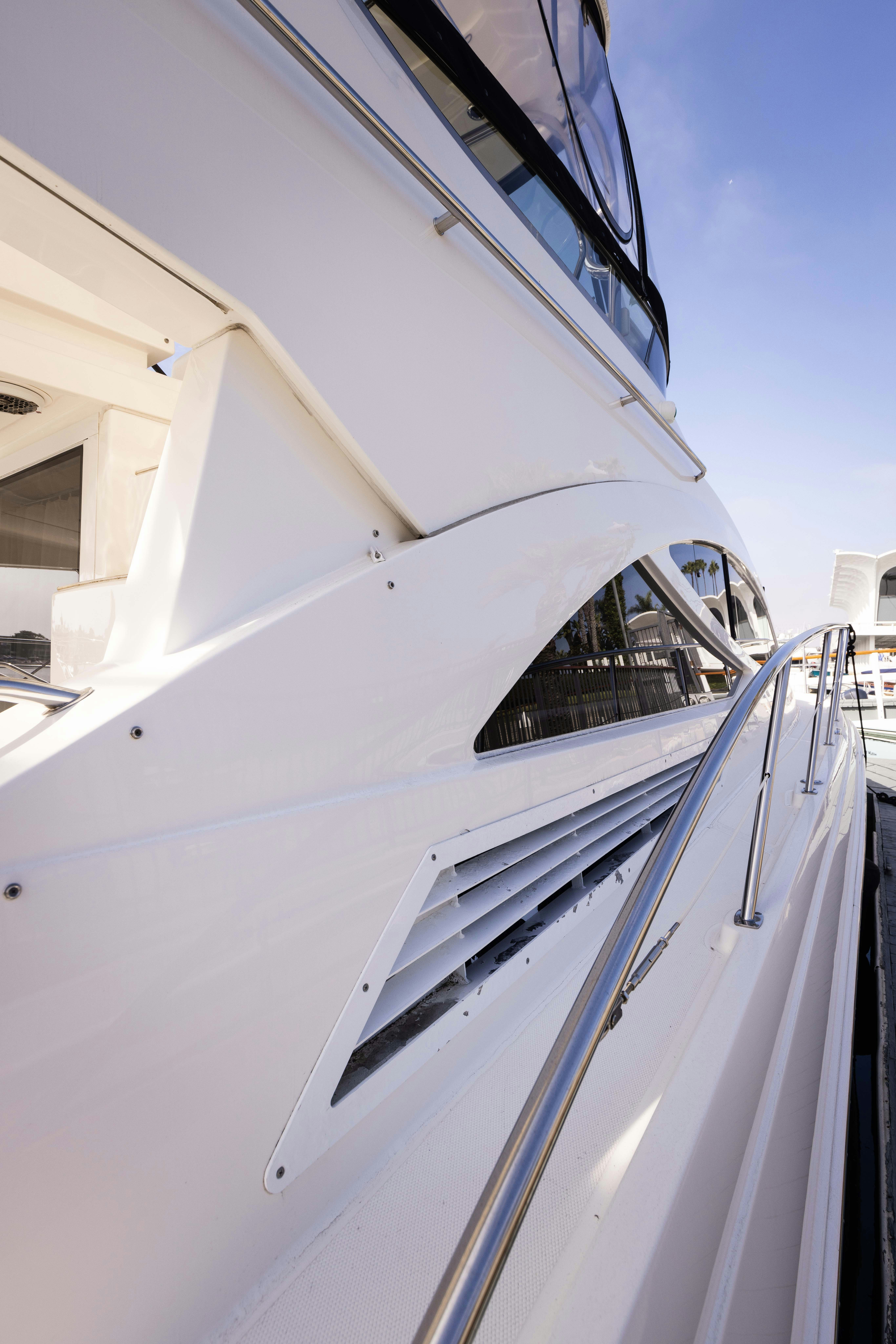a white boat with a black frame aboard KA-BAR Yacht for Sale