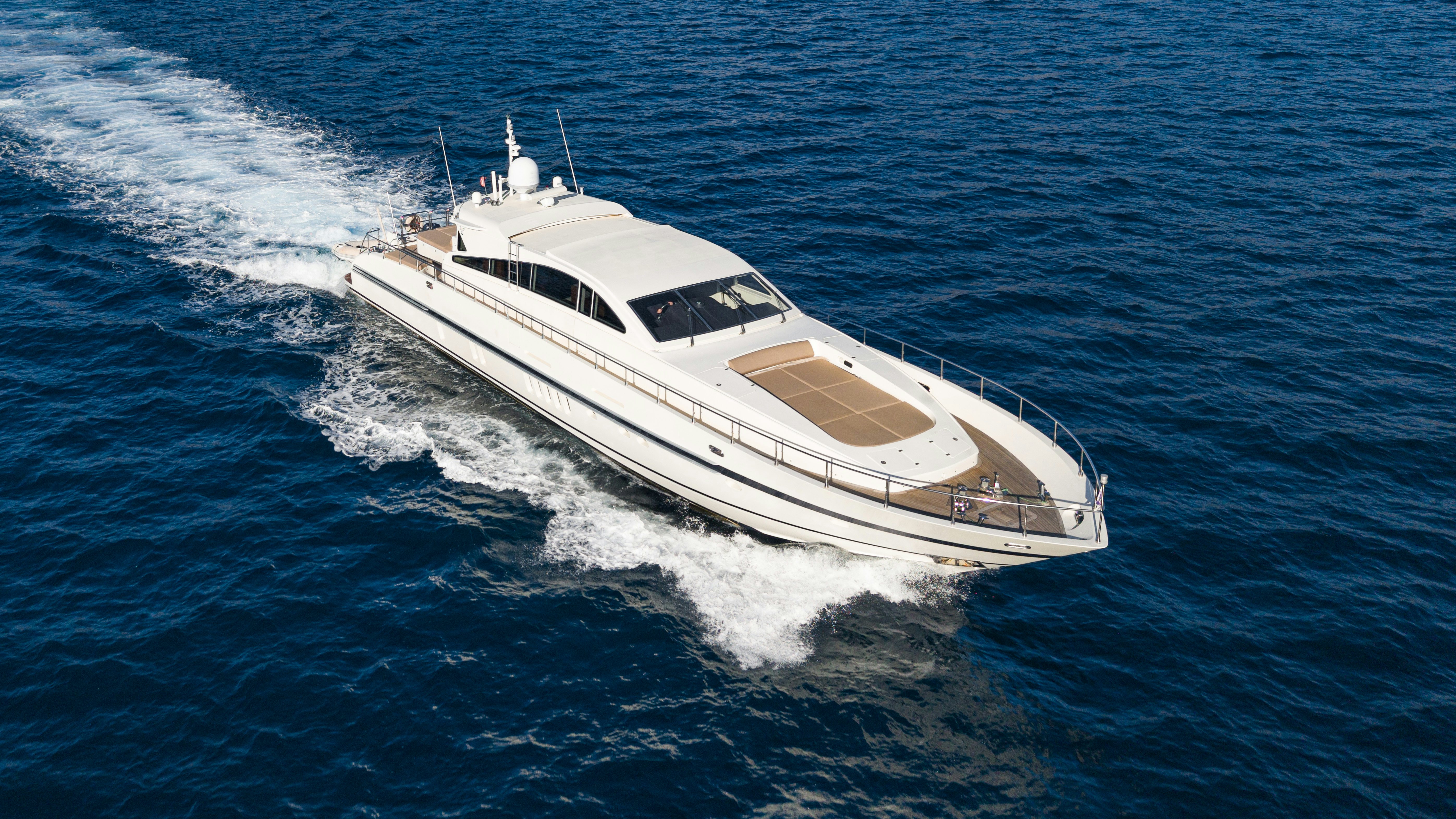 a white yacht on the water aboard CLARITA Yacht for Sale