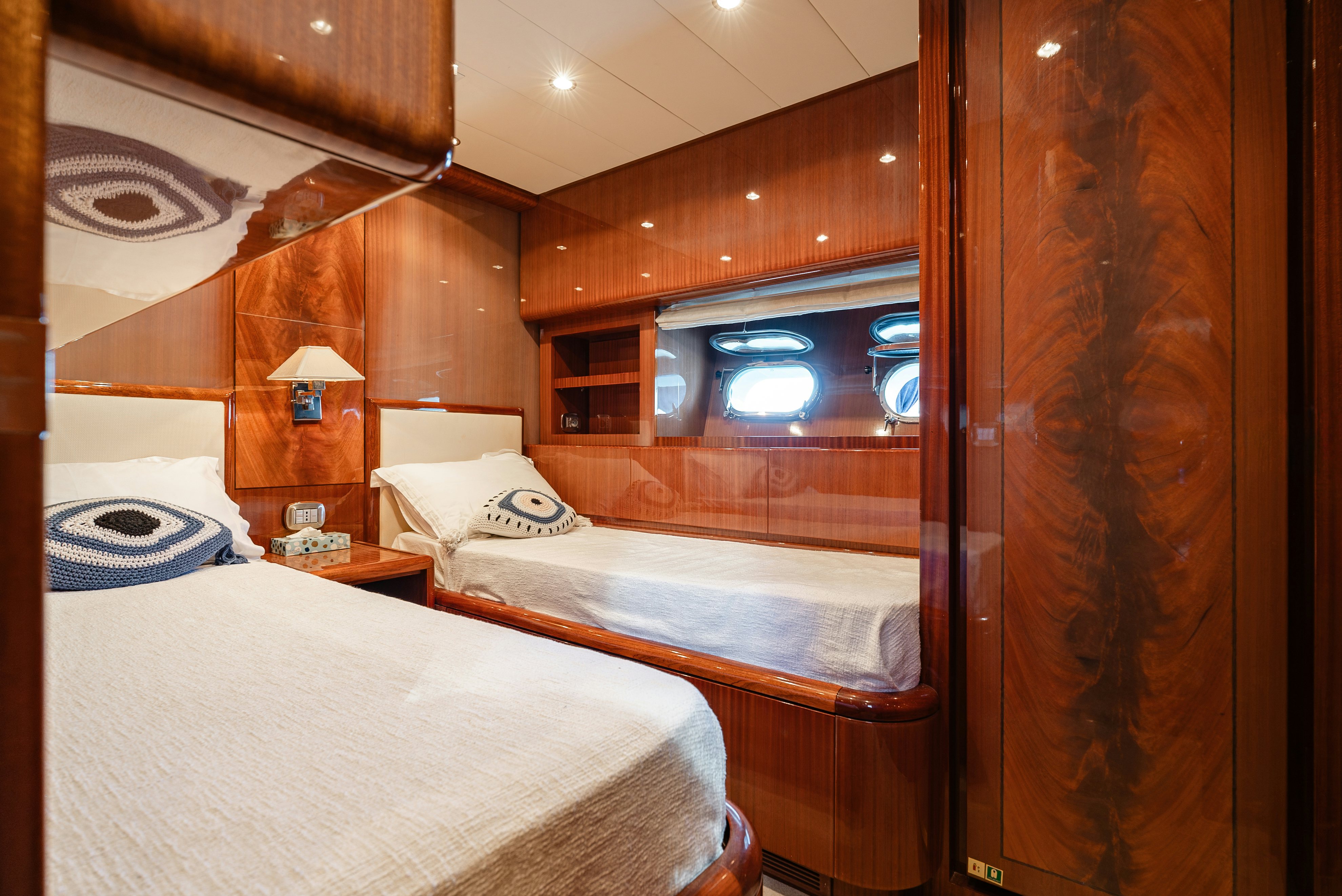 a room with a bed and a television aboard CLARITA Yacht for Sale