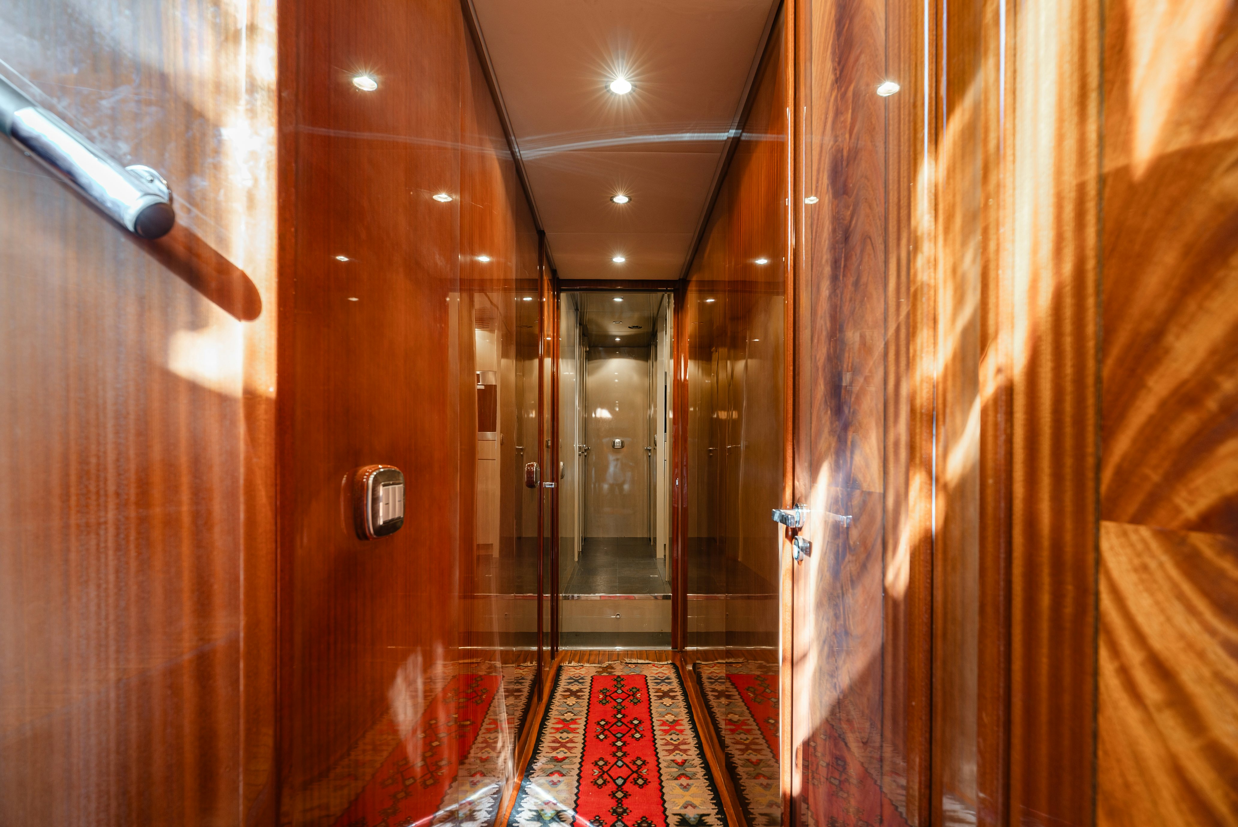 a bathroom with a shower and a sink aboard CLARITA Yacht for Sale