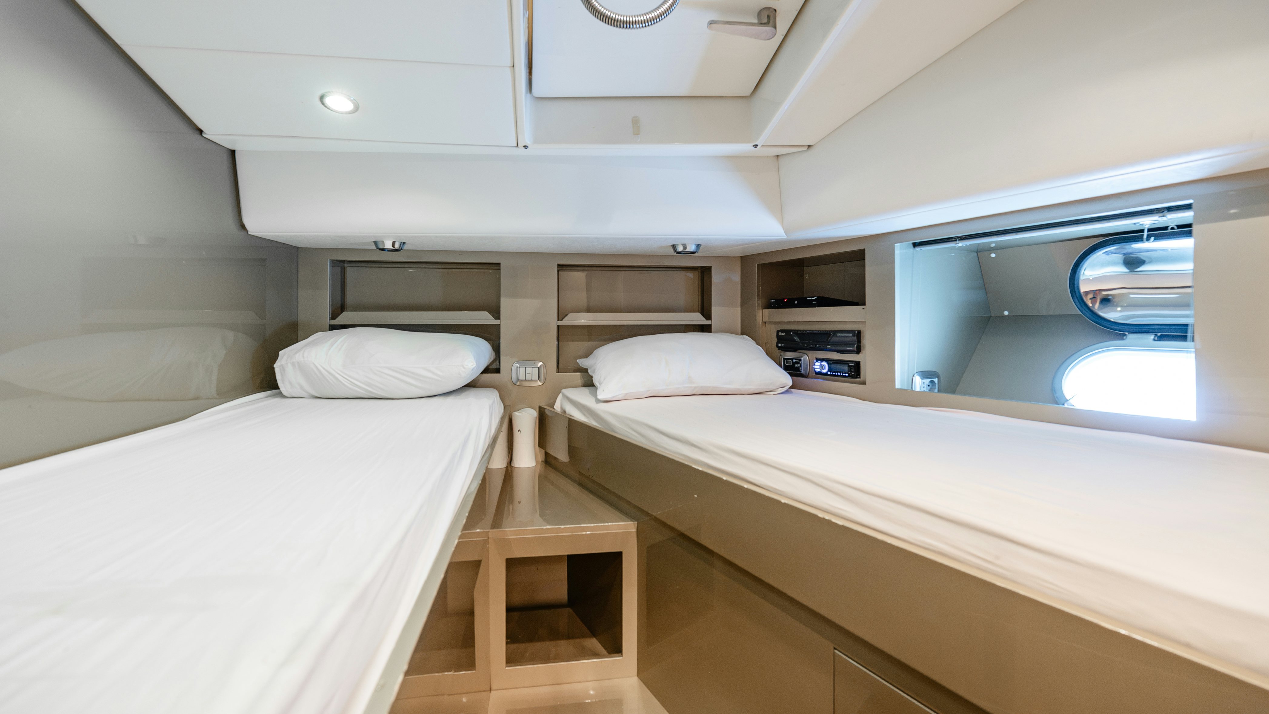 a room with two beds aboard CLARITA Yacht for Sale