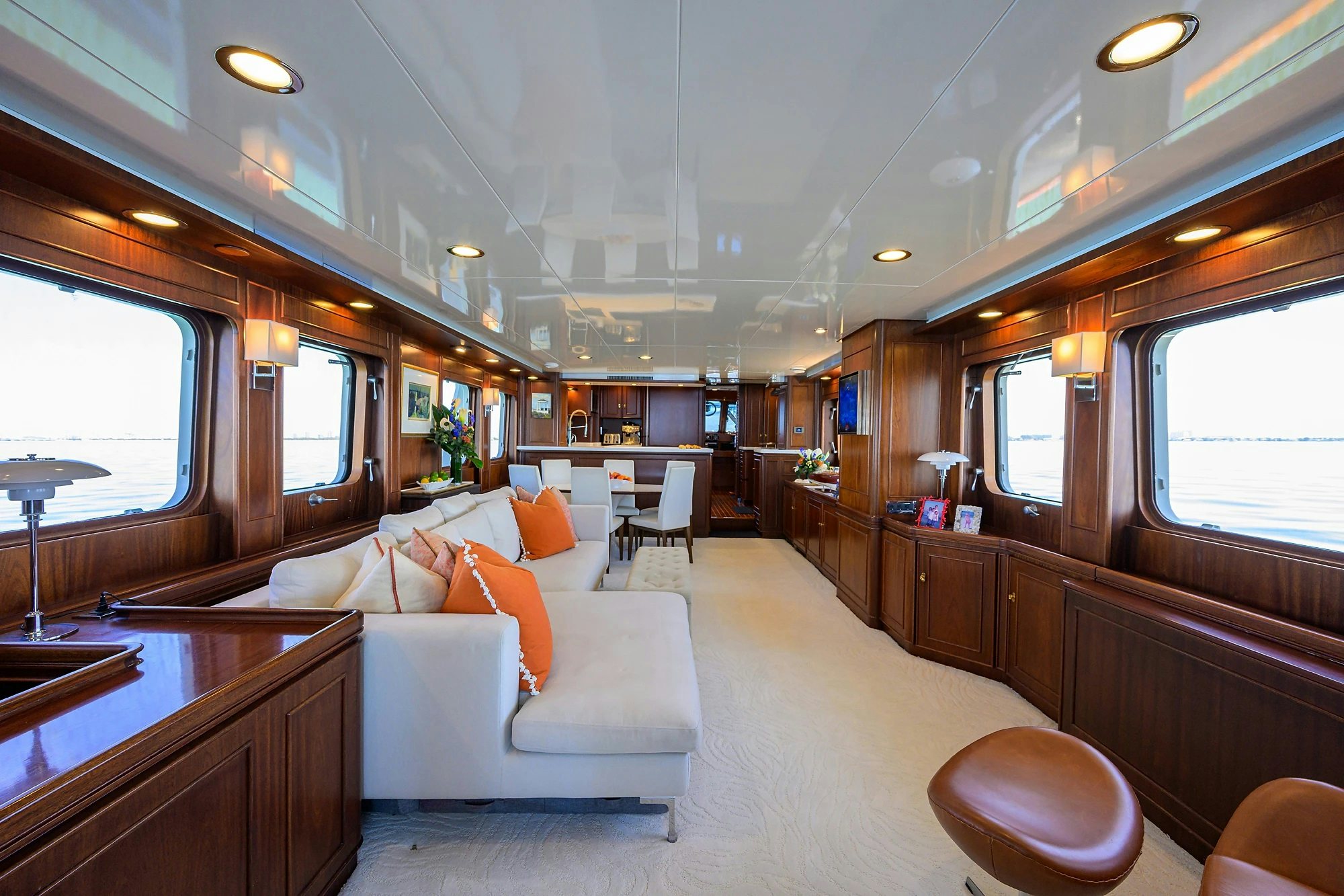 a living room with a couch and a table aboard AVENTURER Yacht for Sale