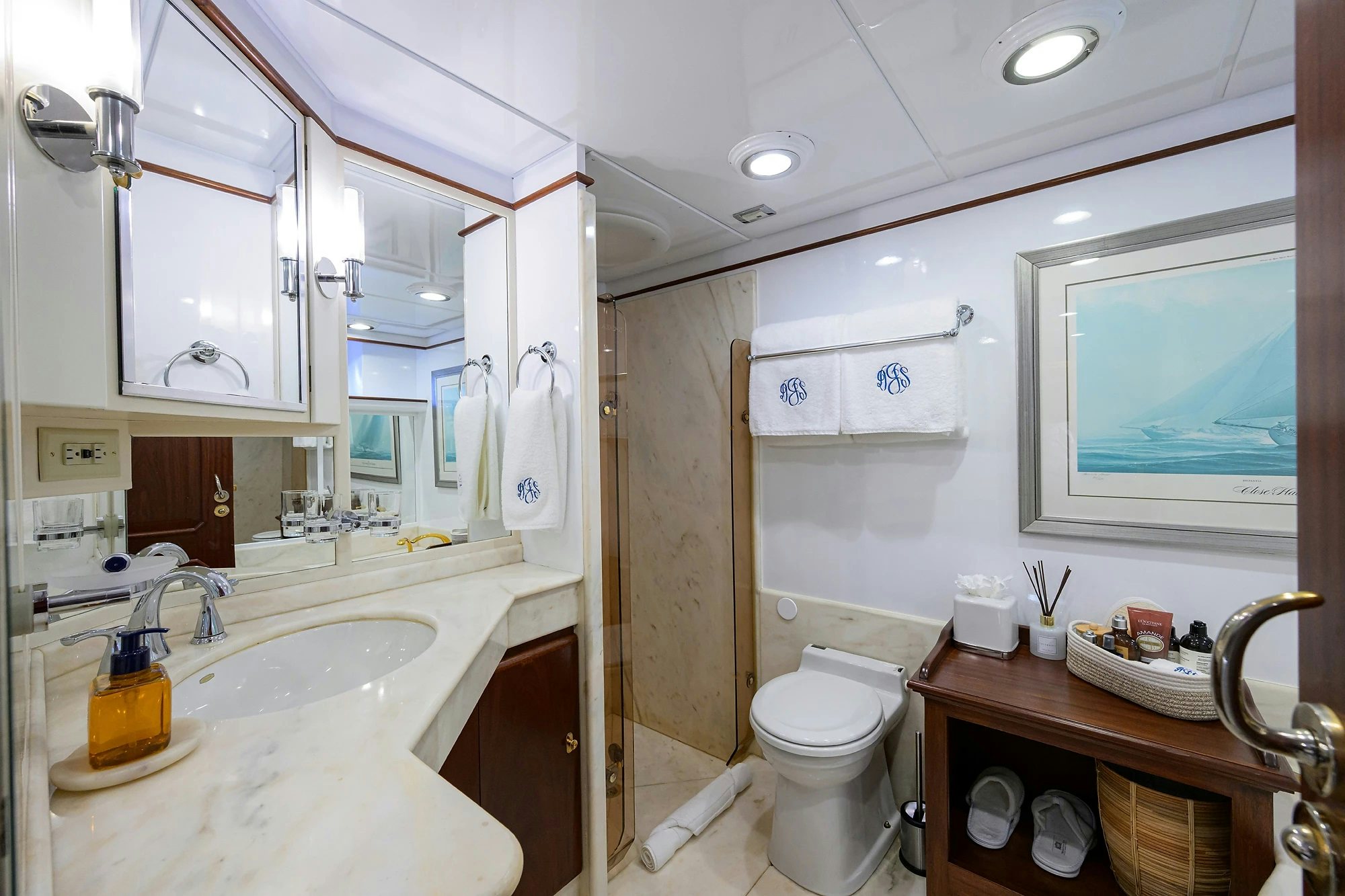 a bathroom with a sink toilet and a bathtub aboard AVENTURER Yacht for Sale