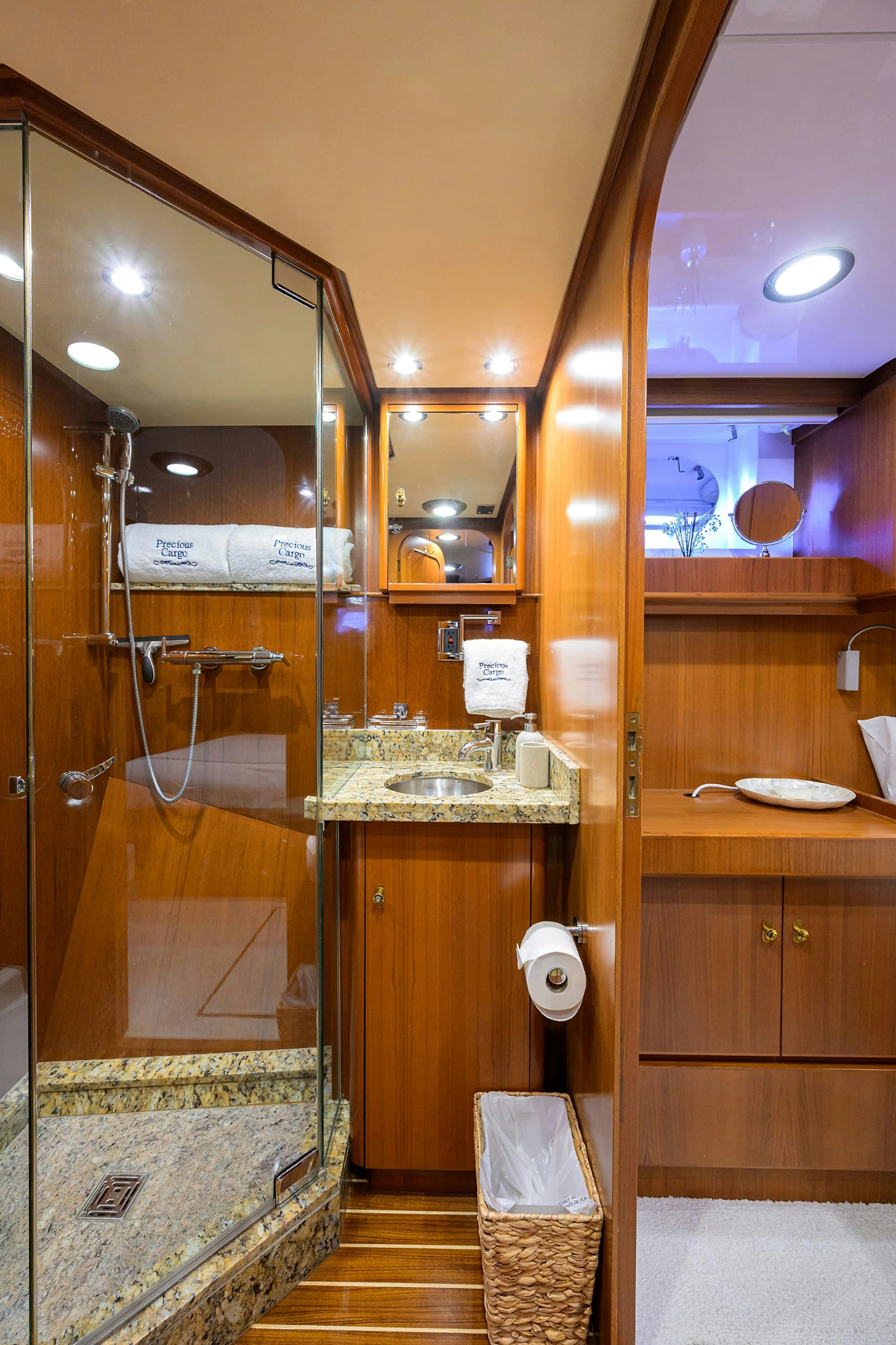 a bathroom with a large mirror aboard AVENTURER Yacht for Sale