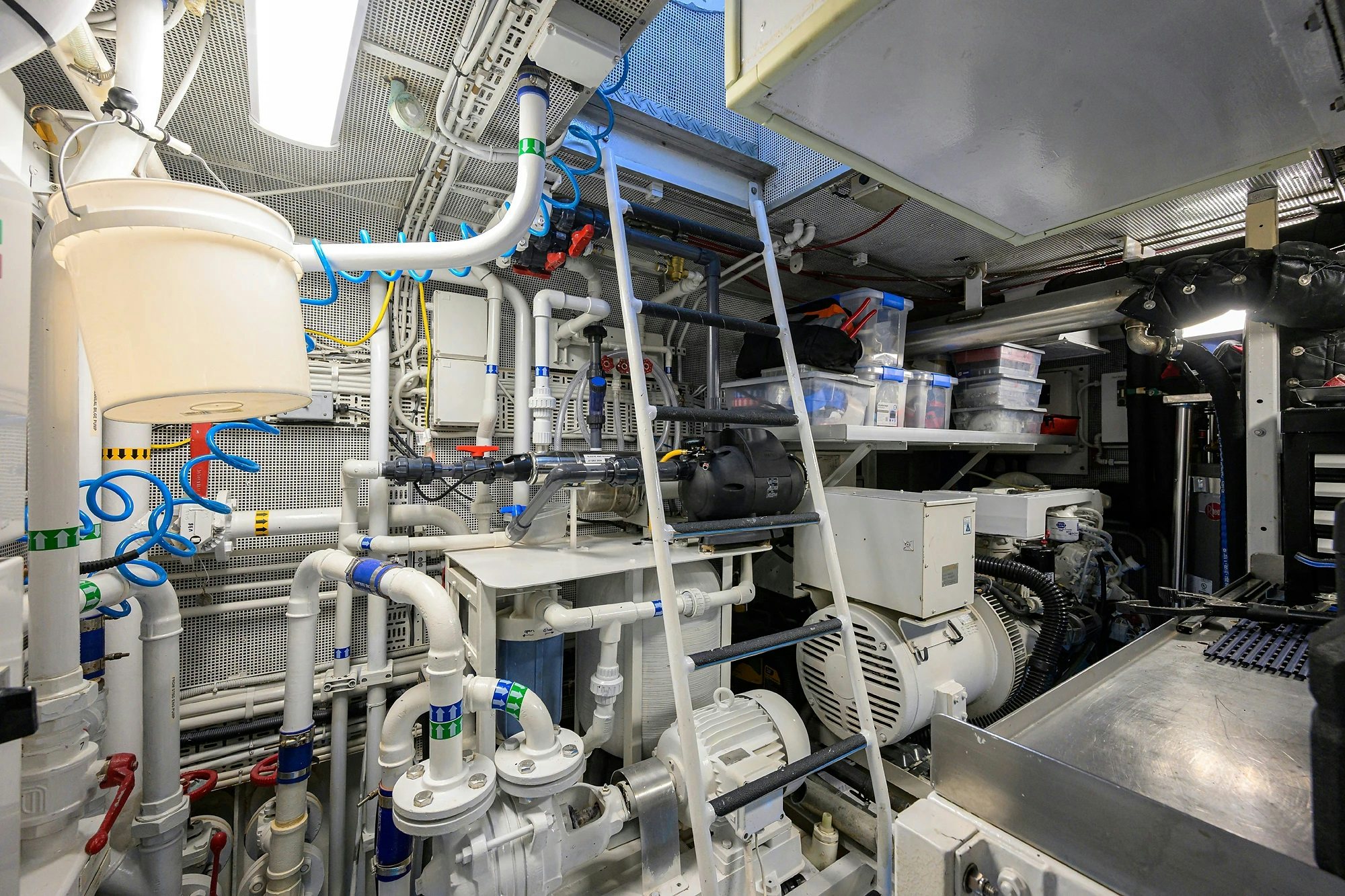 a room with several white pipes aboard AVENTURER Yacht for Sale