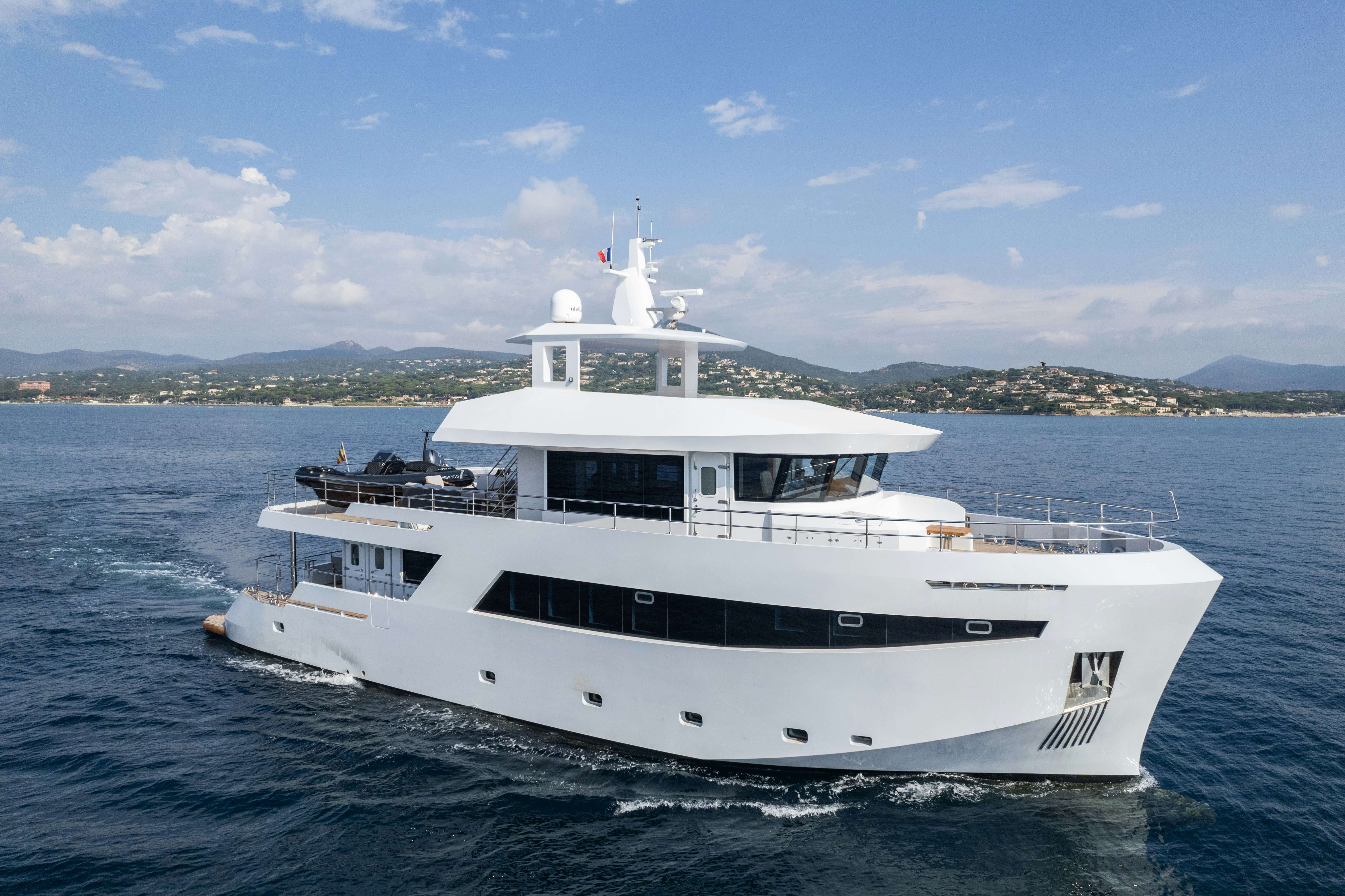 a large white yacht aboard ICE Yacht for Sale