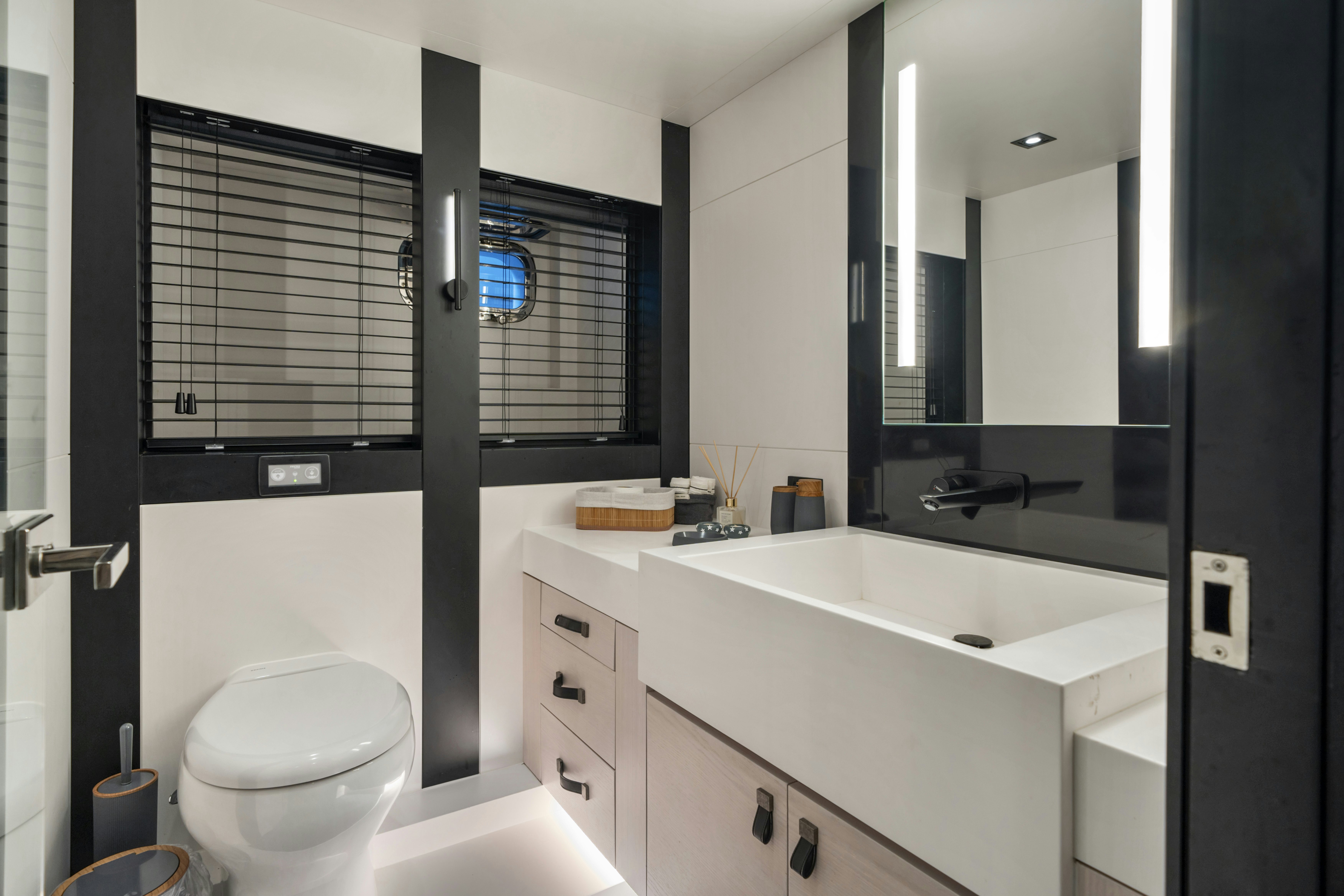 a bathroom with a sink and a toilet aboard ICE Yacht for Sale