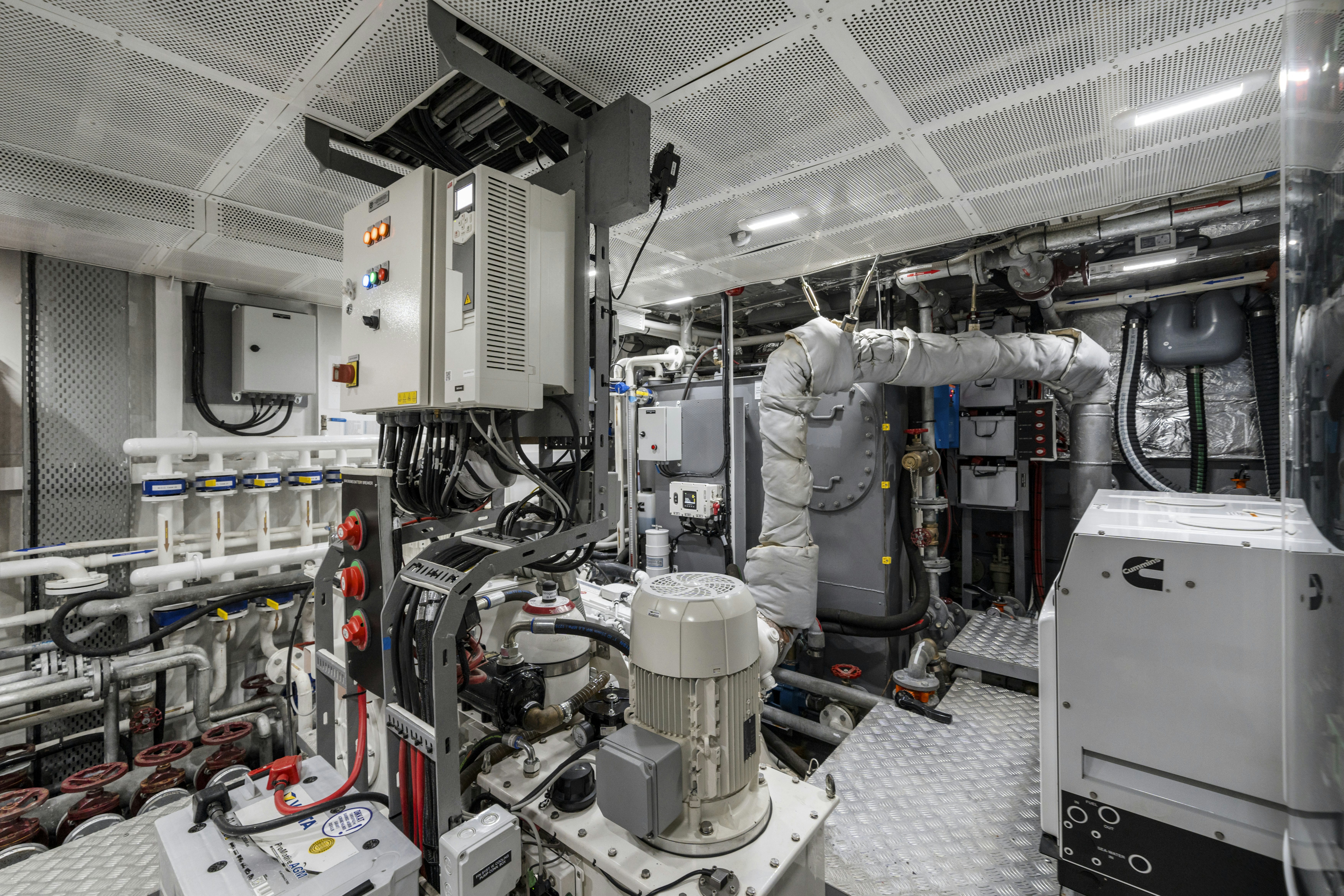 a room with machinery aboard ICE Yacht for Sale