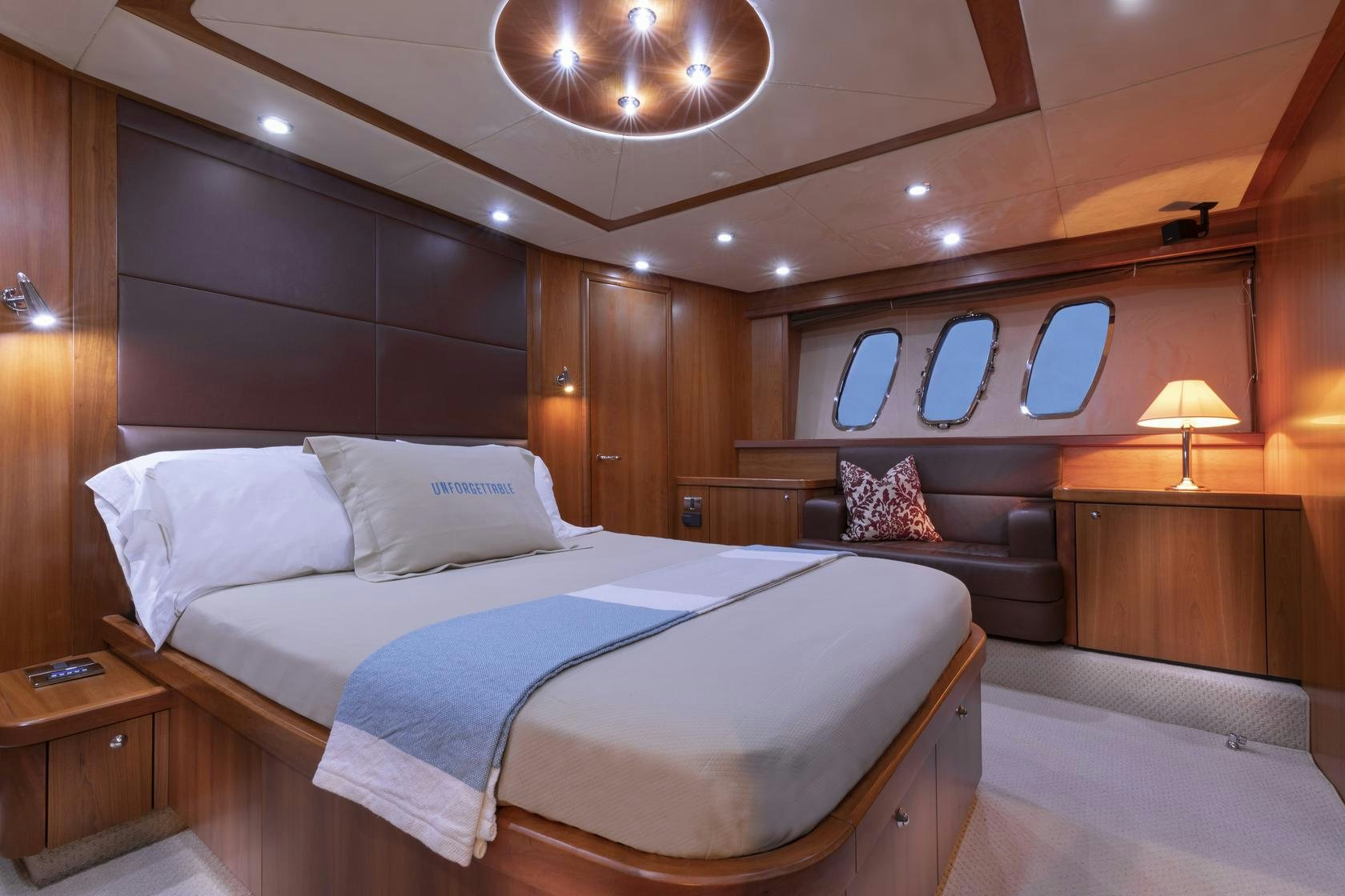 a bed in a room aboard UNFORGETTABLE Yacht for Charter