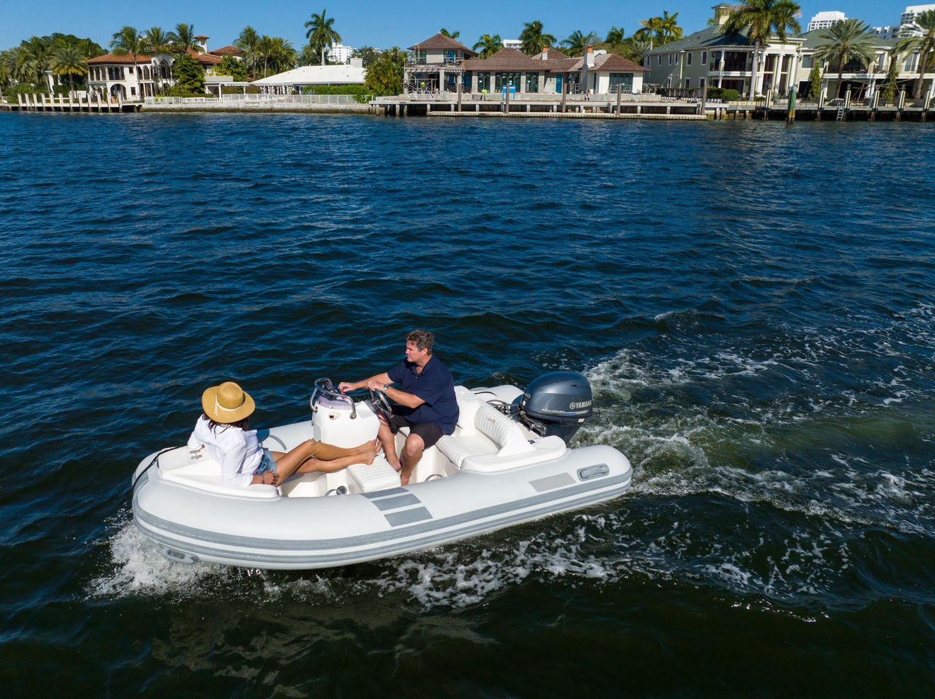 a person in a white boat aboard UNFORGETTABLE Yacht for Charter