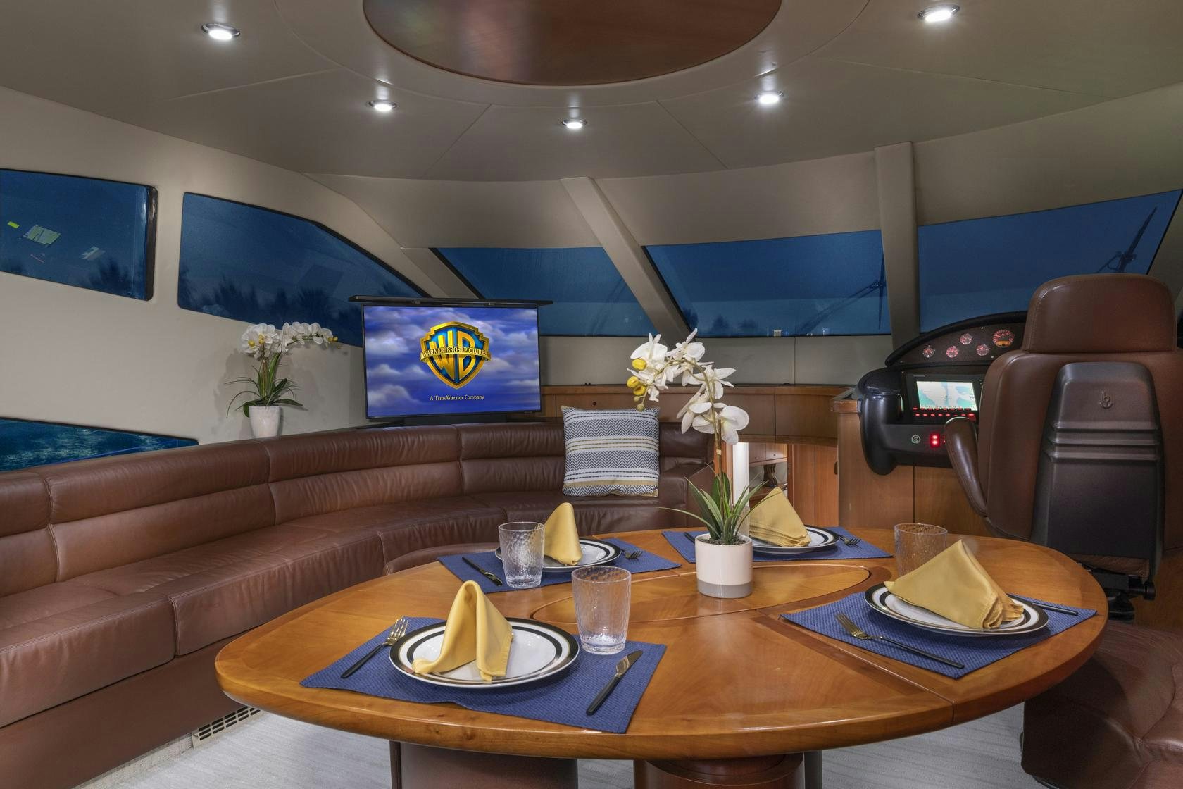 a table with food and drinks on it aboard UNFORGETTABLE Yacht for Charter