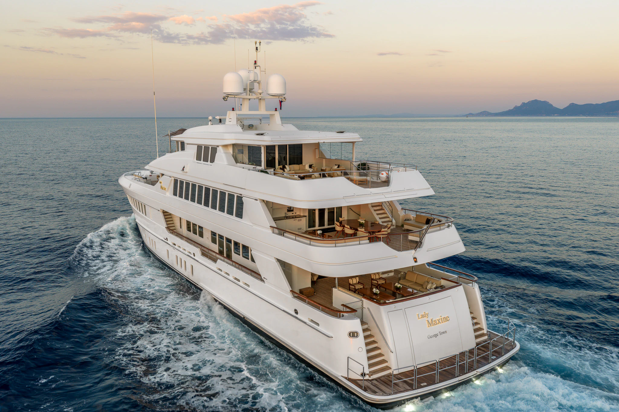 a large white boat in the water aboard LADY MAXINE Yacht for Sale