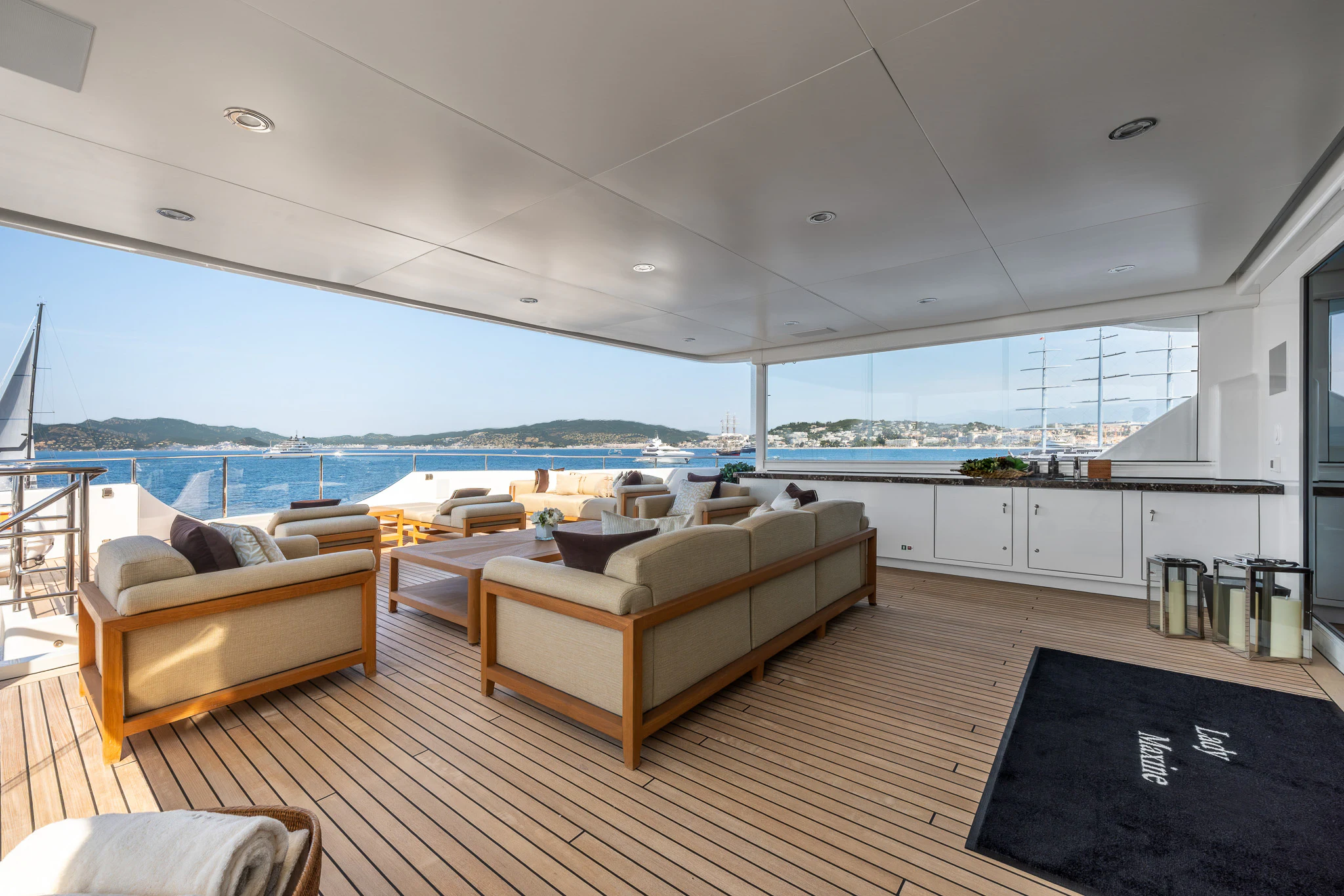 a living room with a large window aboard LADY MAXINE Yacht for Sale
