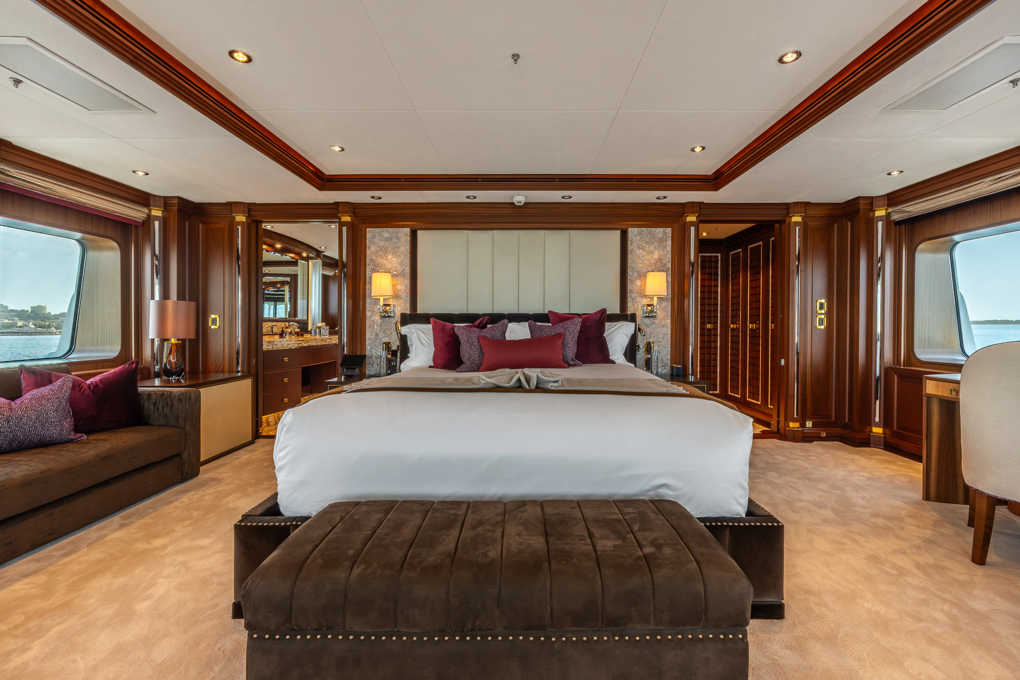 a large bedroom with a large bed aboard LADY MAXINE Yacht for Sale