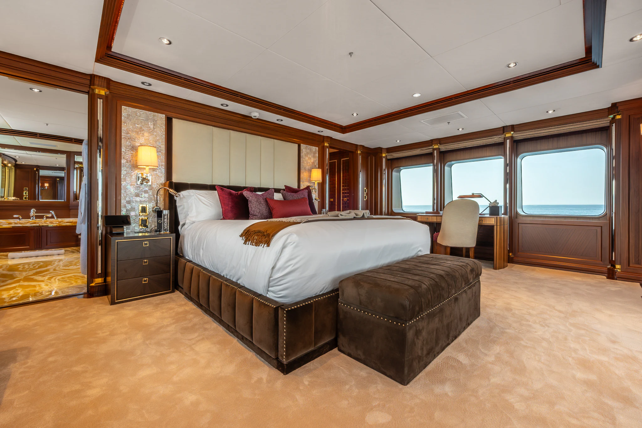 a large bedroom with a large bed aboard LADY MAXINE Yacht for Sale