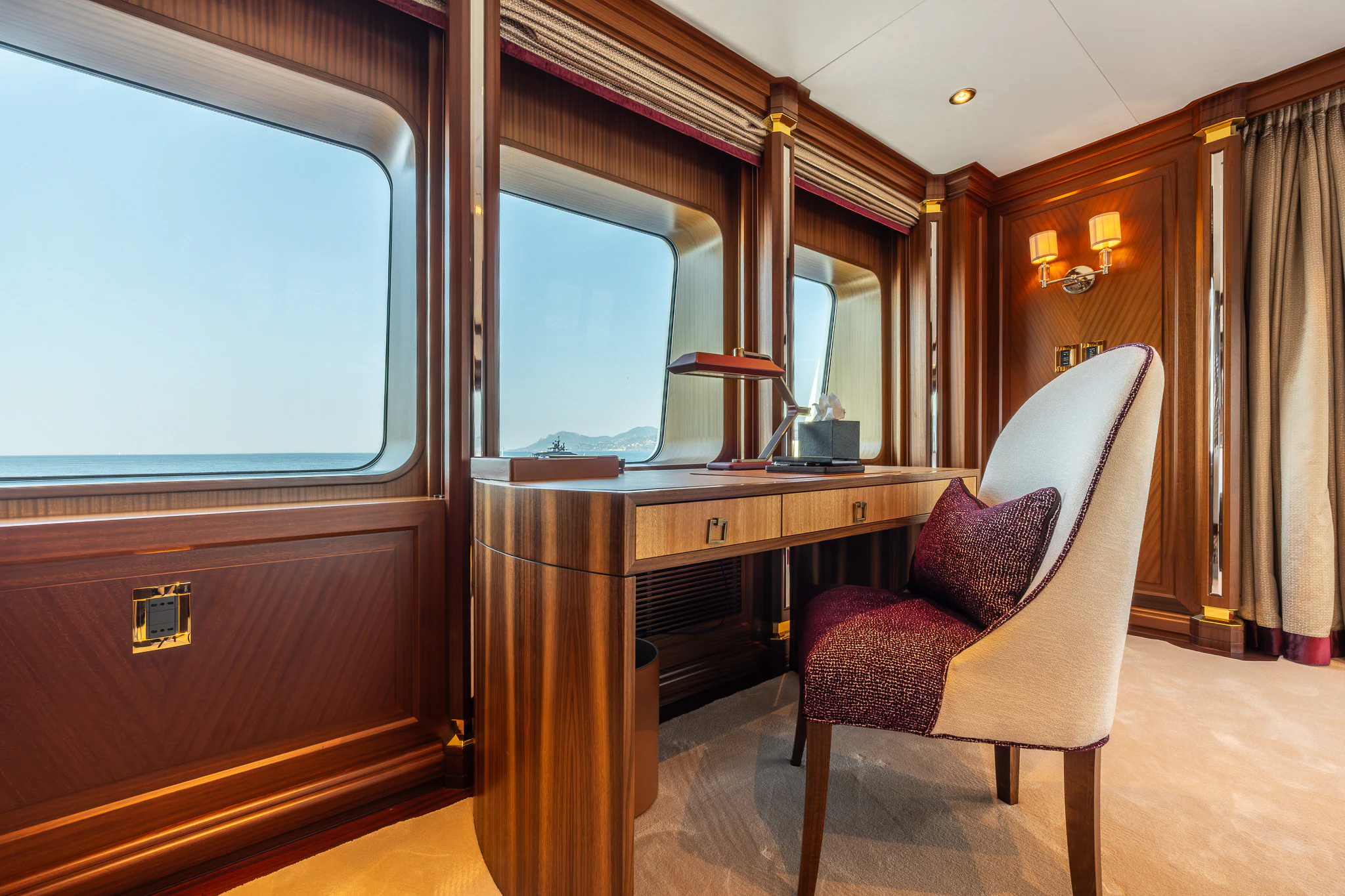 a room with a desk and a chair aboard LADY MAXINE Yacht for Sale