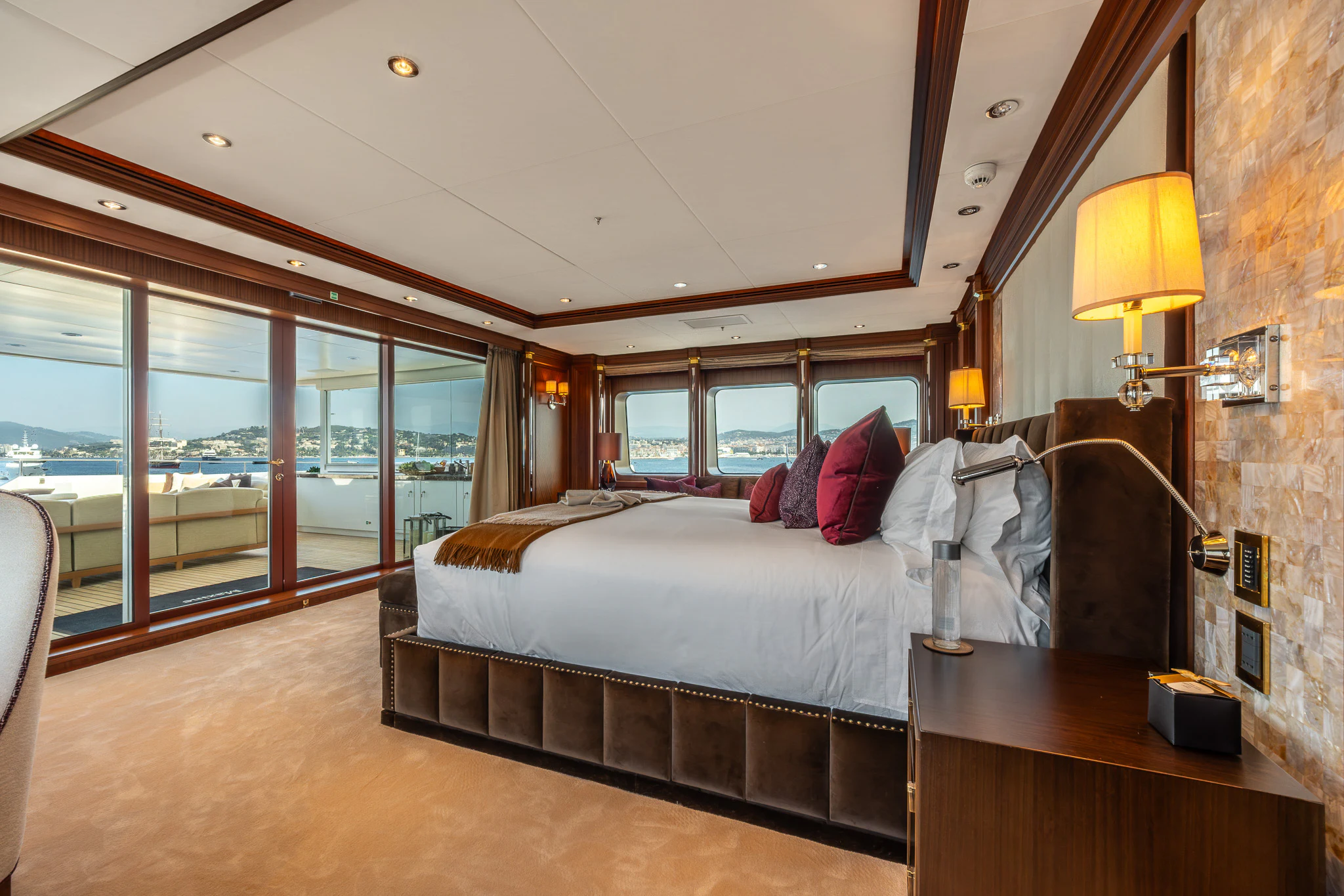 a bed in a room aboard LADY MAXINE Yacht for Sale