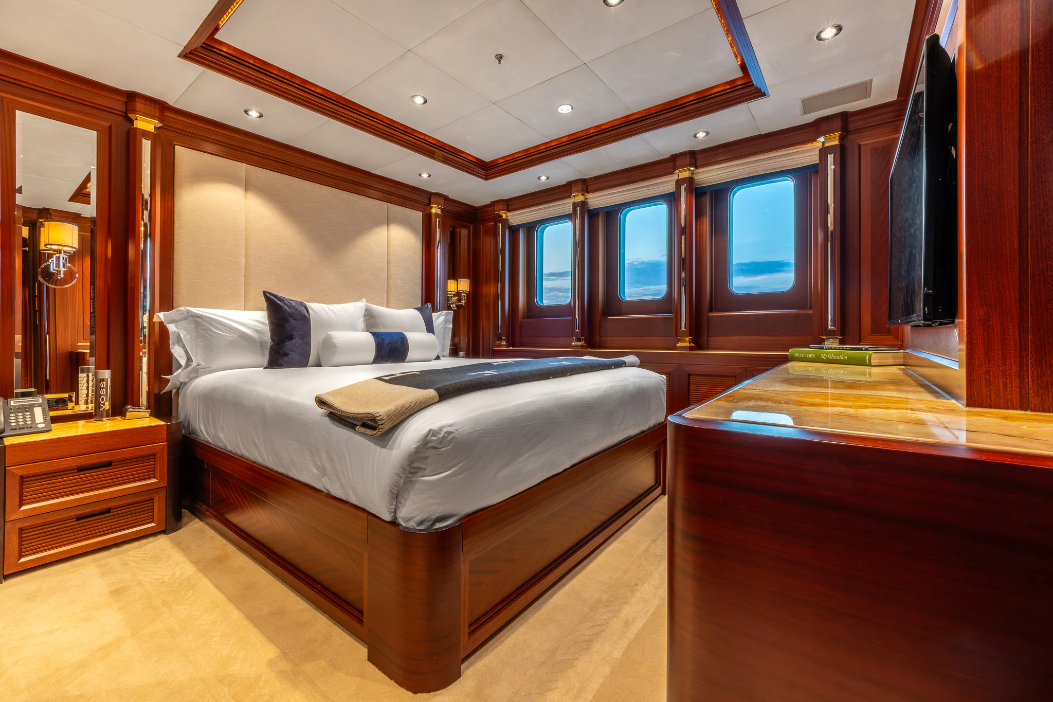 a bed in a room aboard LADY MAXINE Yacht for Sale