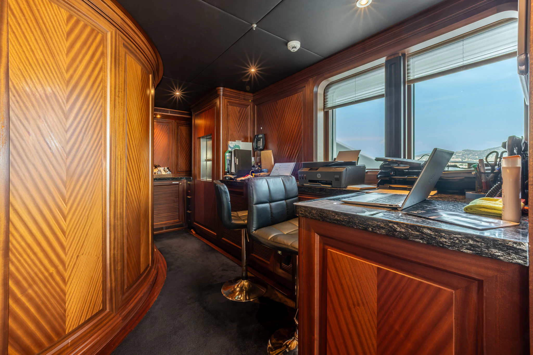 a room with a desk and a computer aboard LADY MAXINE Yacht for Sale