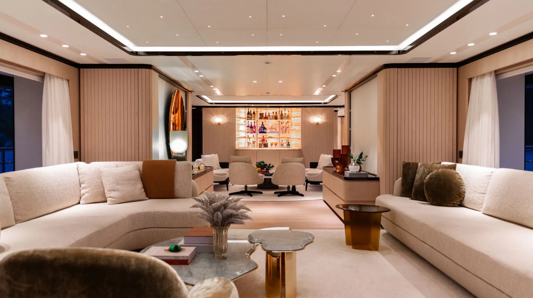 a living room with white couches aboard ALUNYA Yacht for Charter
