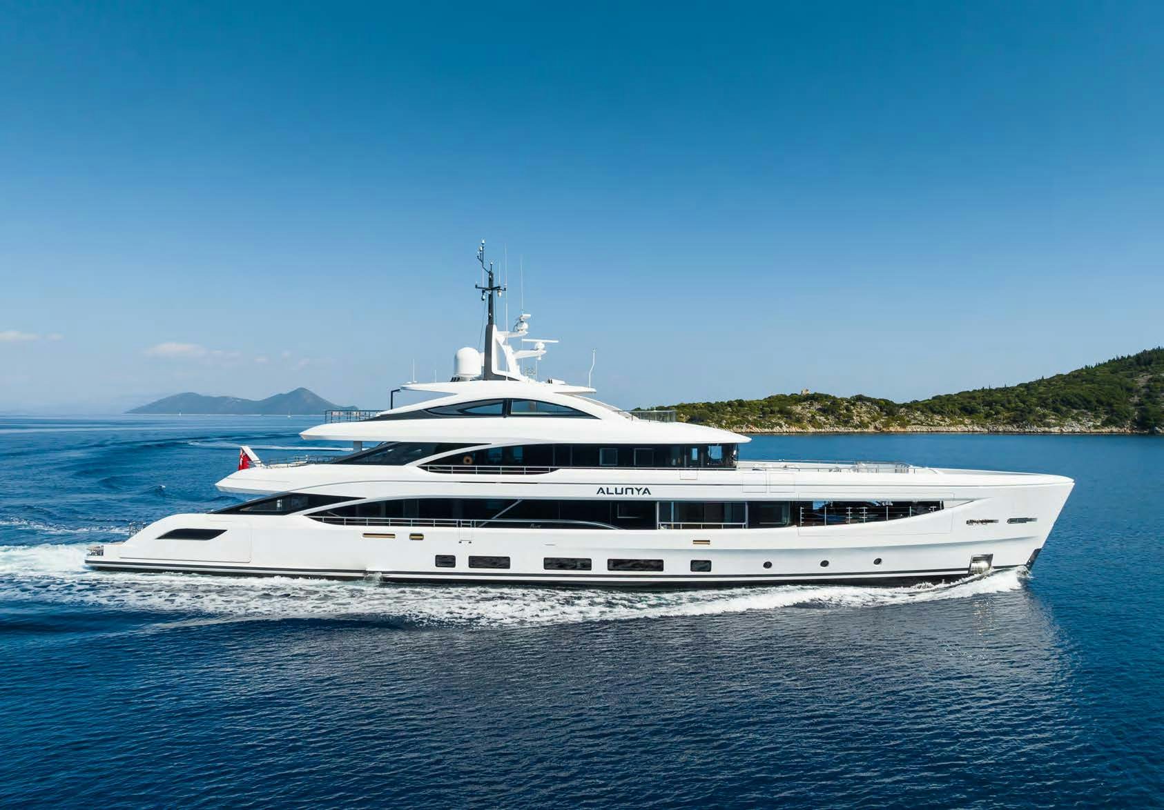 a white yacht on the water aboard ALUNYA Yacht for Charter