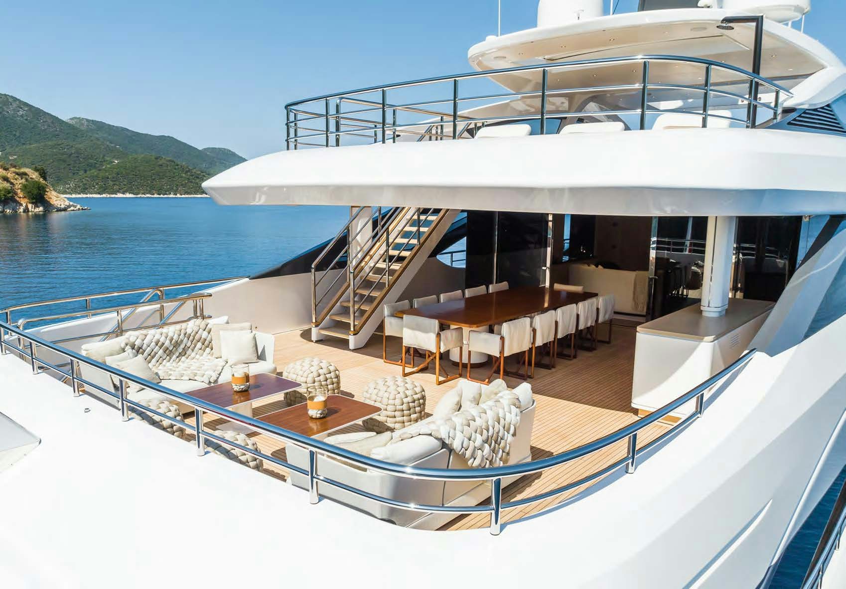 a large white building with a balcony aboard ALUNYA Yacht for Charter