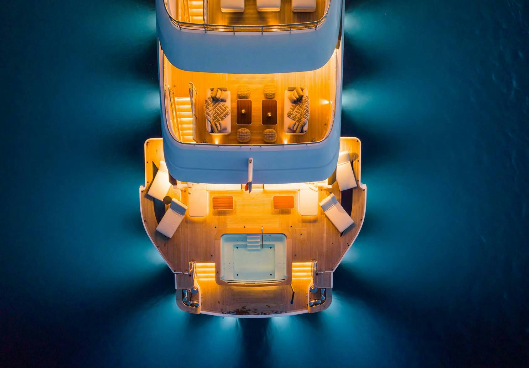 a gold object with a black background aboard ALUNYA Yacht for Charter