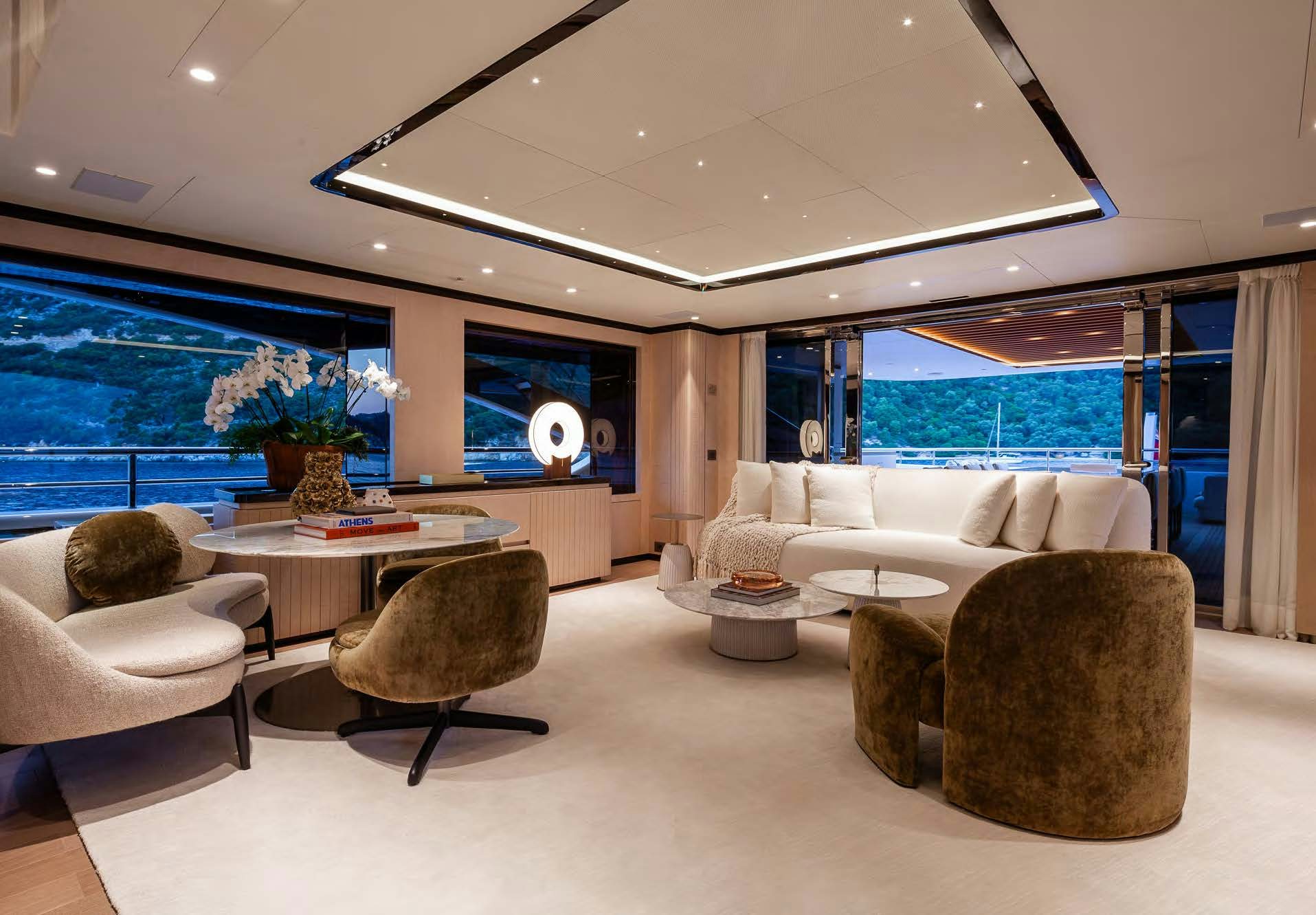a living room with a large window aboard ALUNYA Yacht for Charter