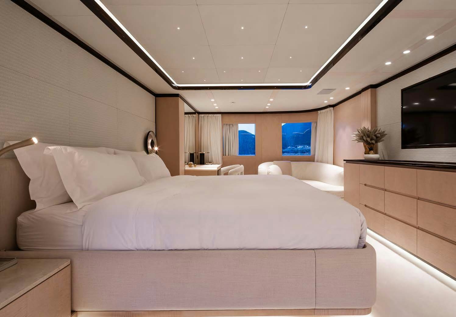 a large bed in a room aboard ALUNYA Yacht for Charter