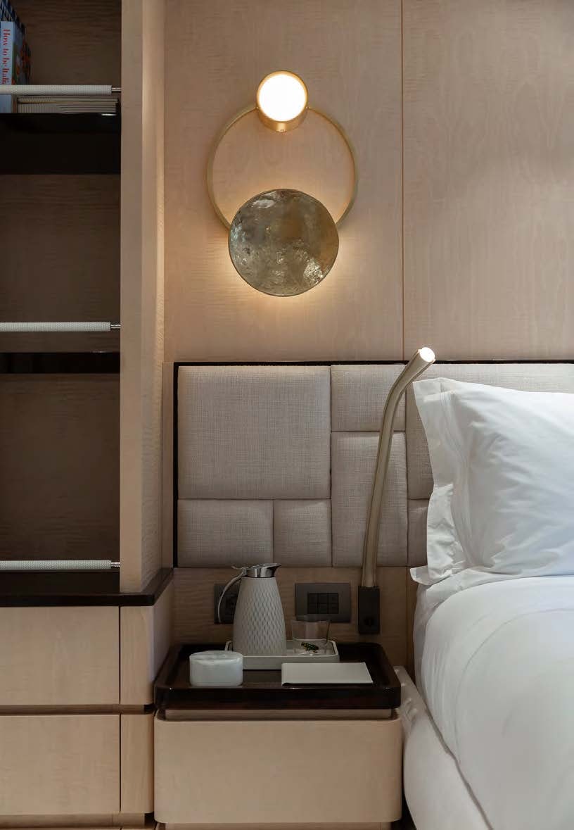 a mirror above a bed aboard ALUNYA Yacht for Charter