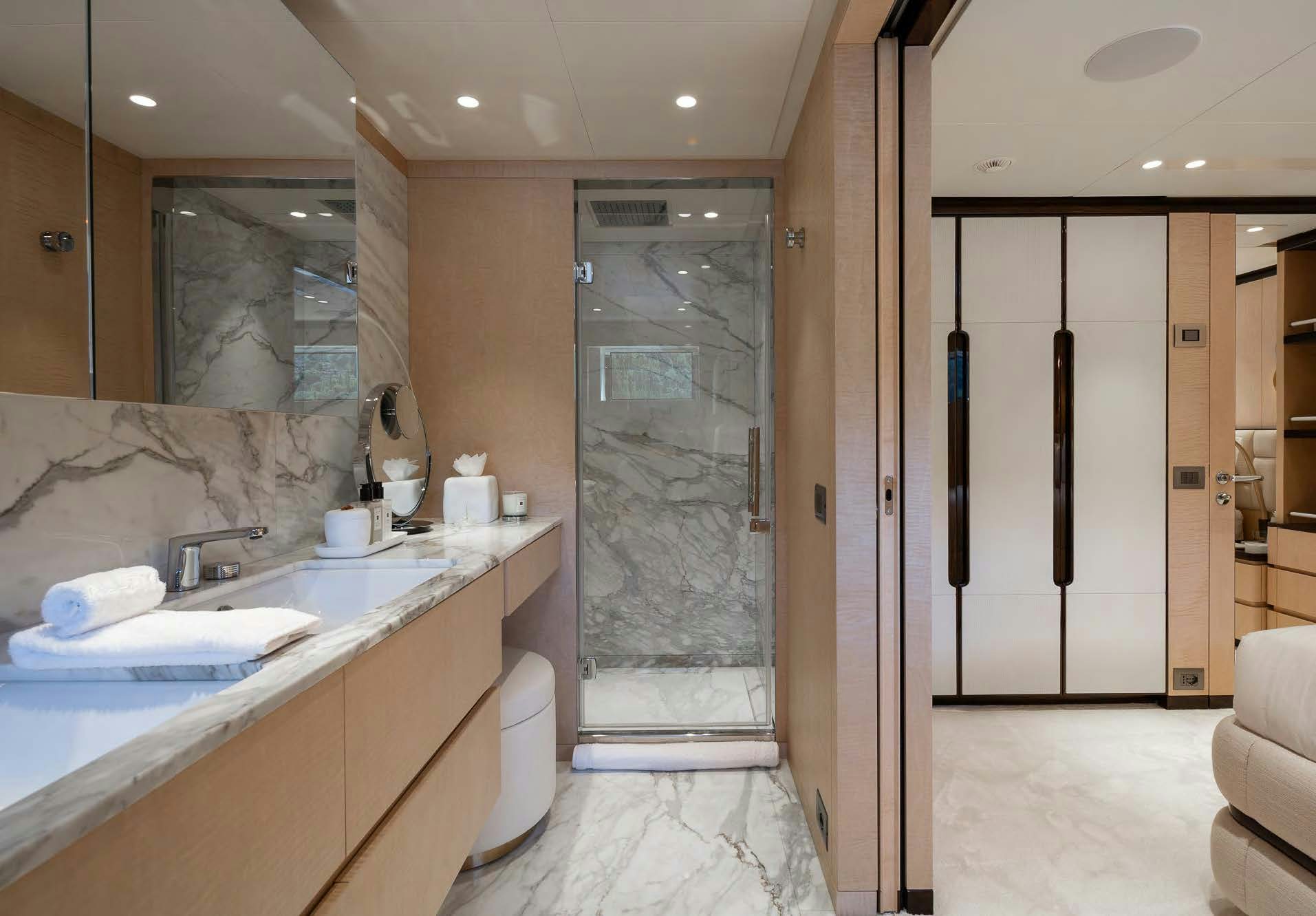 a bathroom with a sink and a shower aboard ALUNYA Yacht for Charter