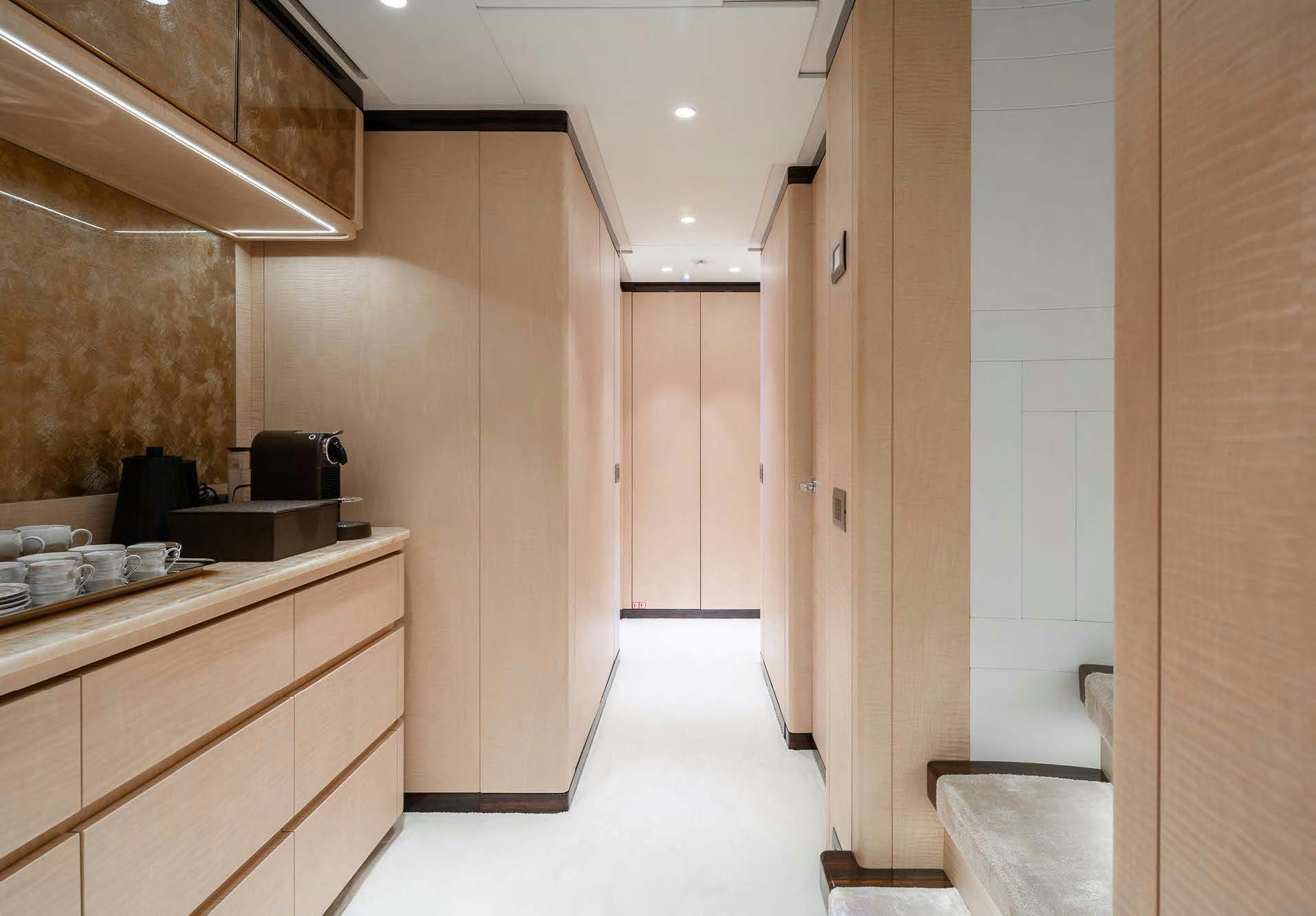 a kitchen with a sink and cabinets aboard ALUNYA Yacht for Charter