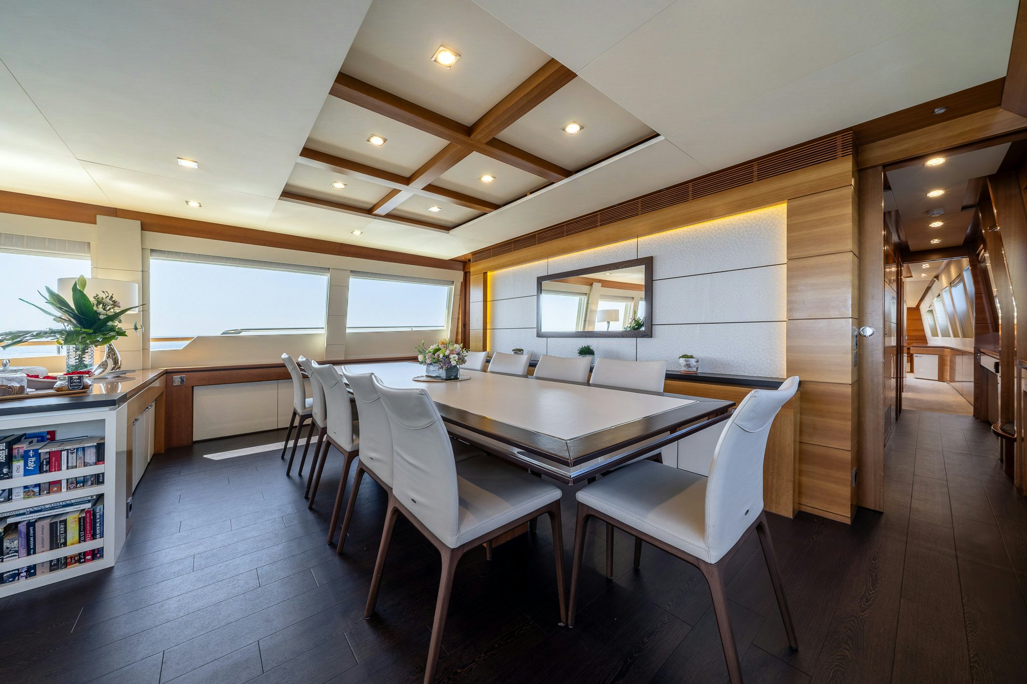 a large kitchen with a dining table aboard ARION Yacht for Sale