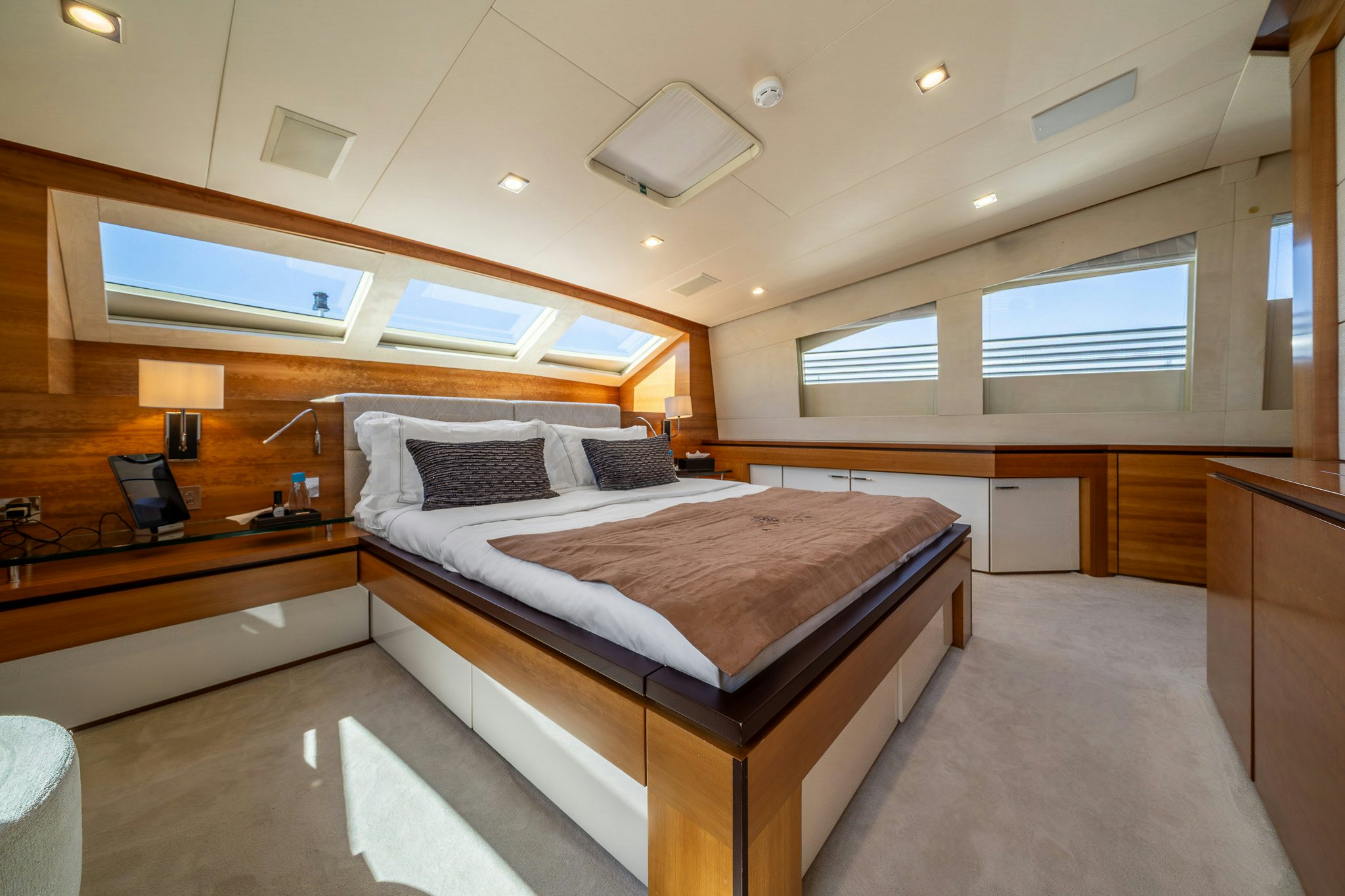 a room with a bed and a desk aboard ARION Yacht for Sale