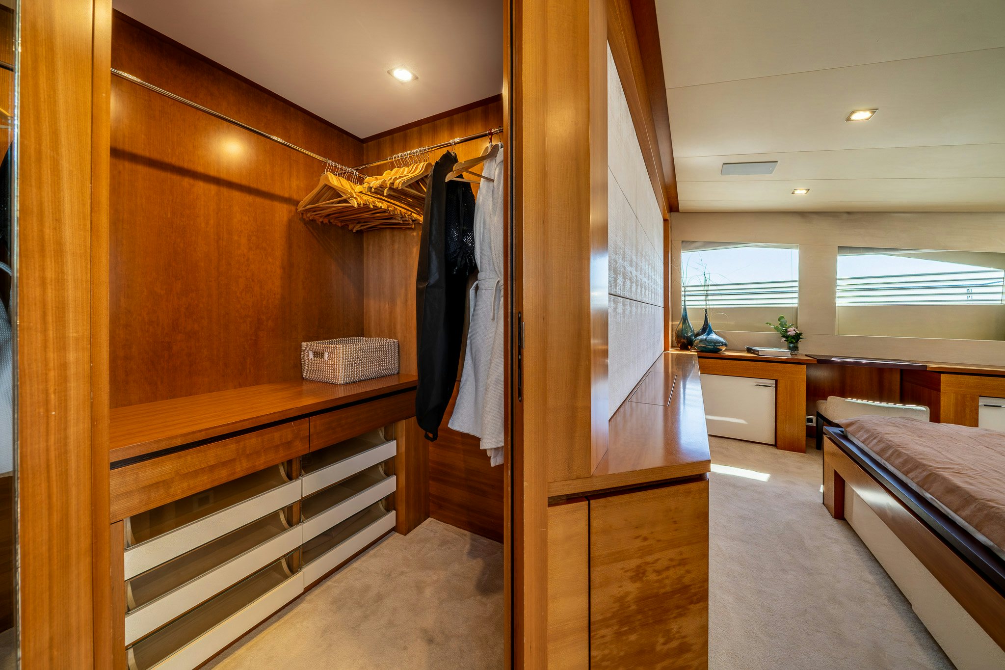a room with a bed and a closet aboard ARION Yacht for Sale