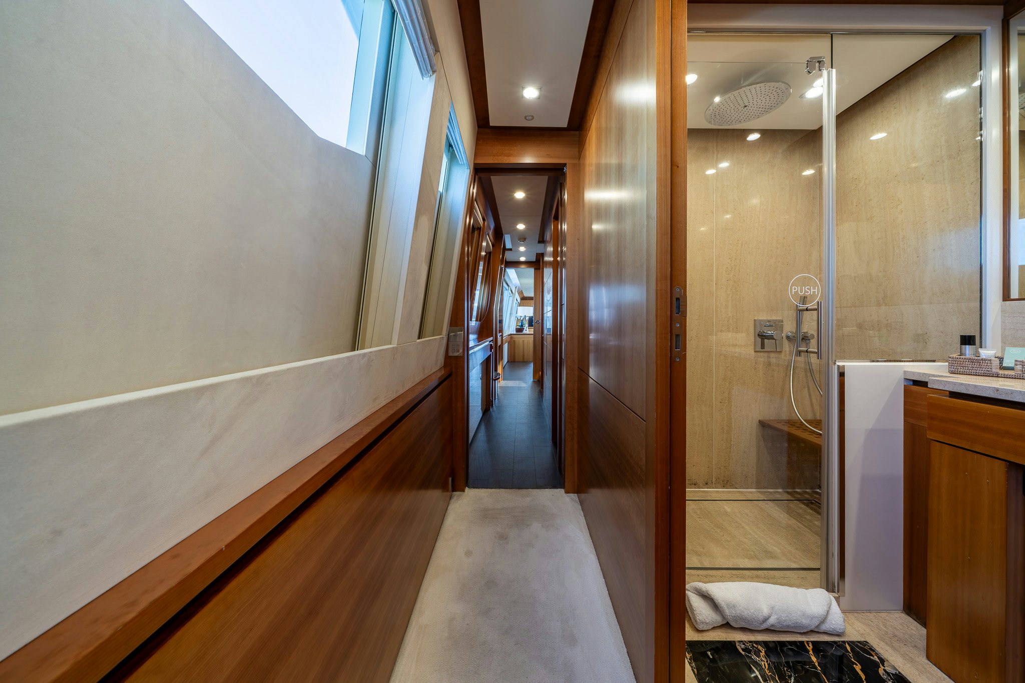 a bathroom with a glass shower aboard ARION Yacht for Sale